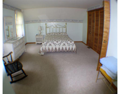 379 Town Farm Road Barre, MA 01005 - Photo 6 of 6 a bedroom with a bed and a couch