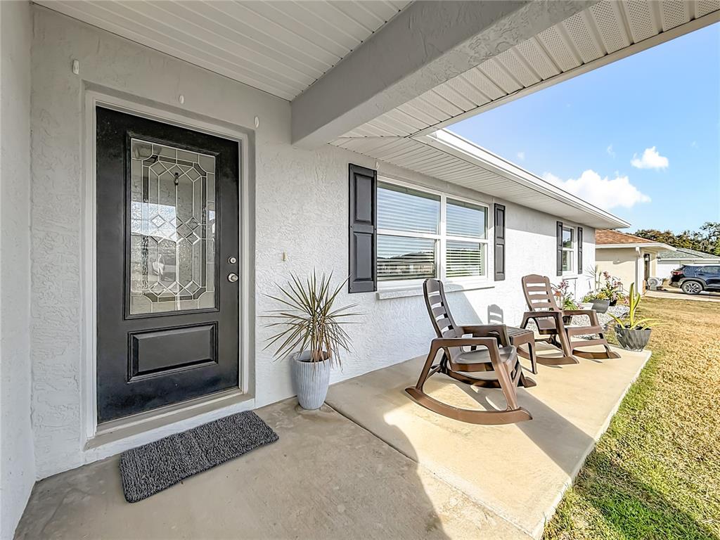 4445 East Maryland Street Inverness, FL 34453 - Photo 11 of 46 a living room with furniture and a window