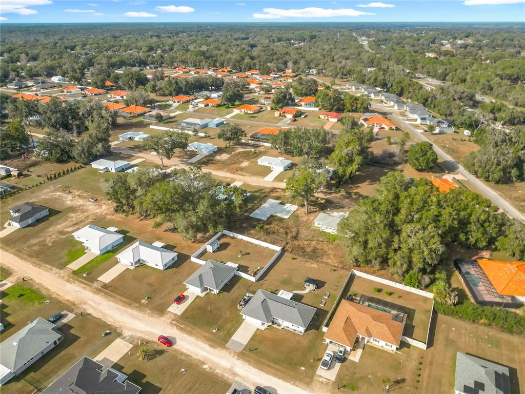 4445 East Maryland Street Inverness, FL 34453 - Photo 3 of 46 an aerial view of residential houses with outdoor space