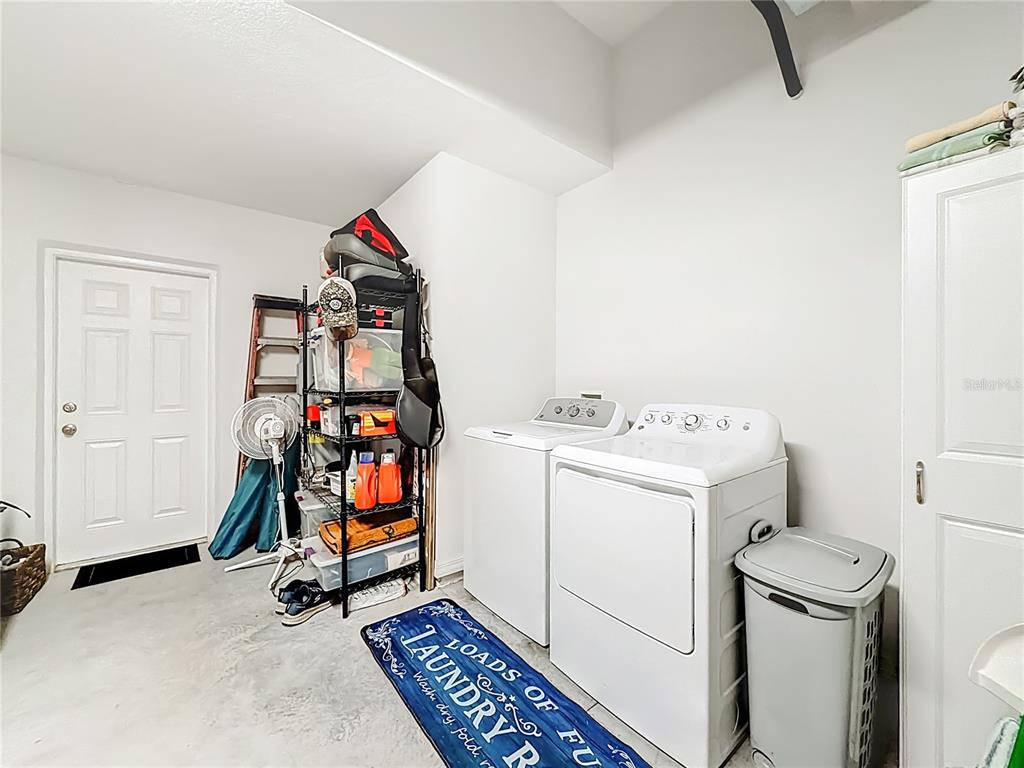 4445 East Maryland Street Inverness, FL 34453 - Photo 36 of 46 a utility room with dryer and washer