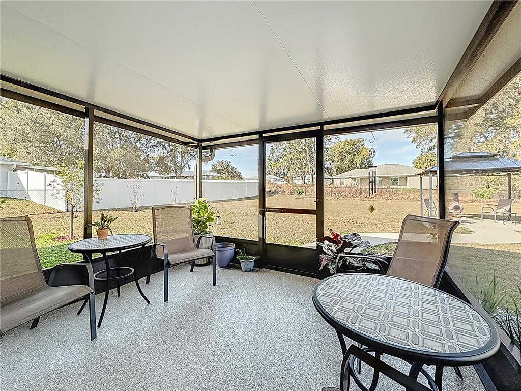 4445 East Maryland Street Inverness, FL 34453 - Photo 37 of 46 a living room with furniture and a large window