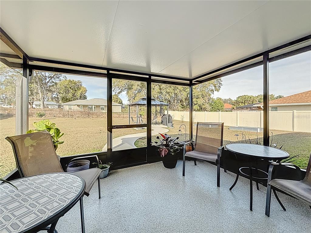 4445 East Maryland Street Inverness, FL 34453 - Photo 38 of 46 a living room with furniture and a large window