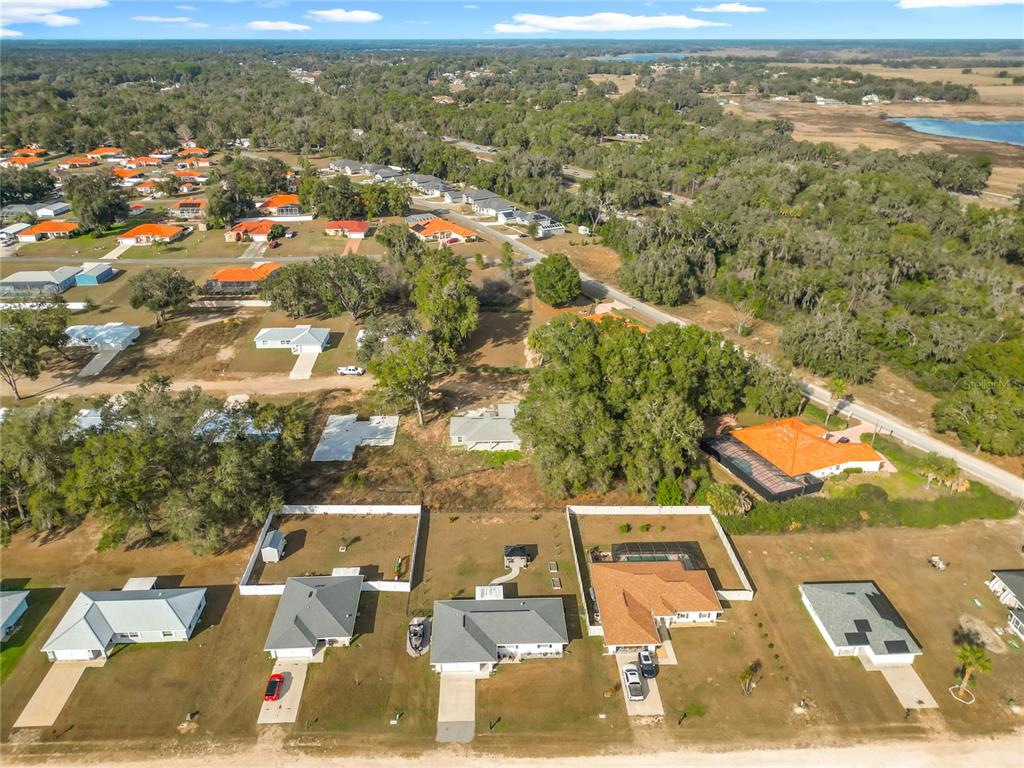 4445 East Maryland Street Inverness, FL 34453 - Photo 4 of 46 an aerial view of residential houses with outdoor space