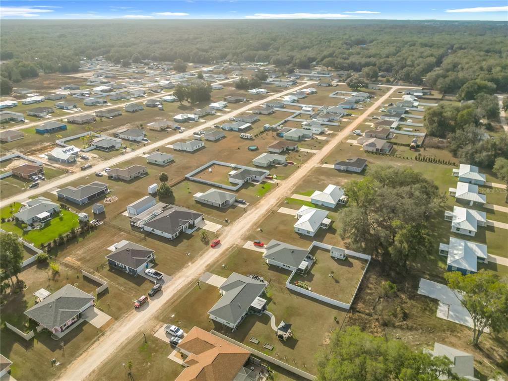 4445 East Maryland Street Inverness, FL 34453 - Photo 45 of 46 an aerial view of residential building and ocean