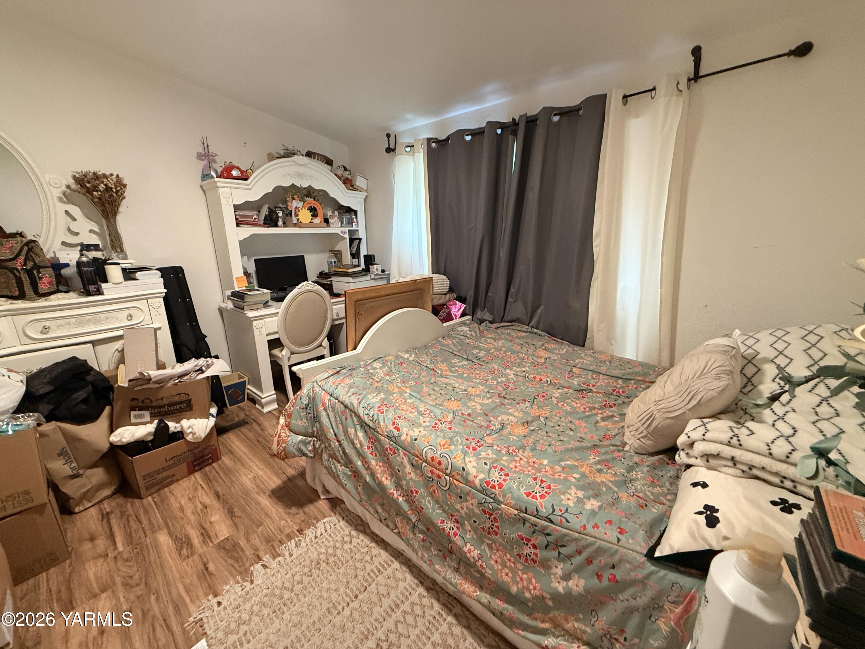 1051 County Line Mabton, WA 98935 - Photo 13 of 22 a bed sitting in a bedroom next to a window