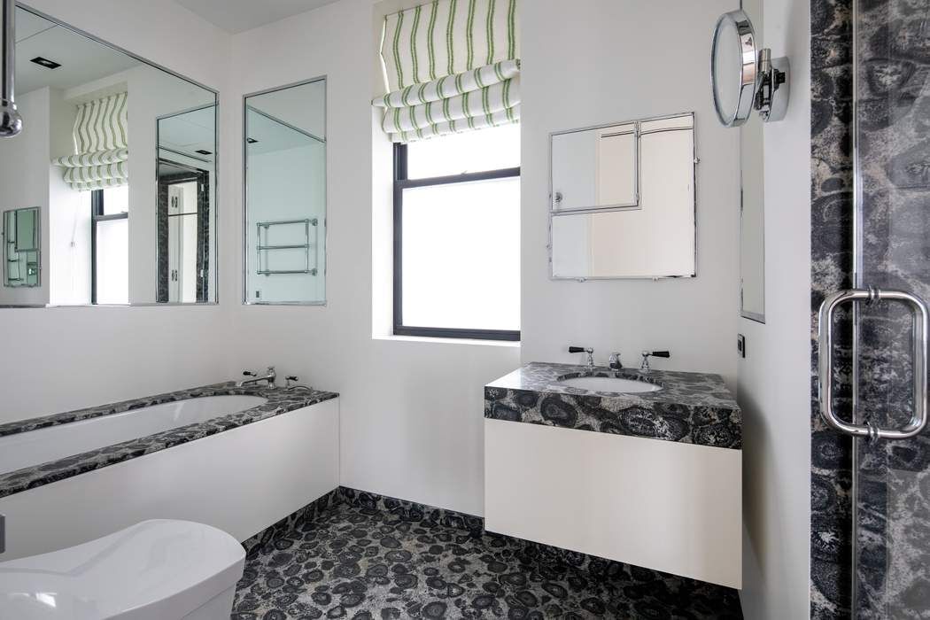784 Park Avenue, Unit PHC Manhattan, NY 10021 - Photo 20 of 36 a bathroom with a granite countertop sink and a window