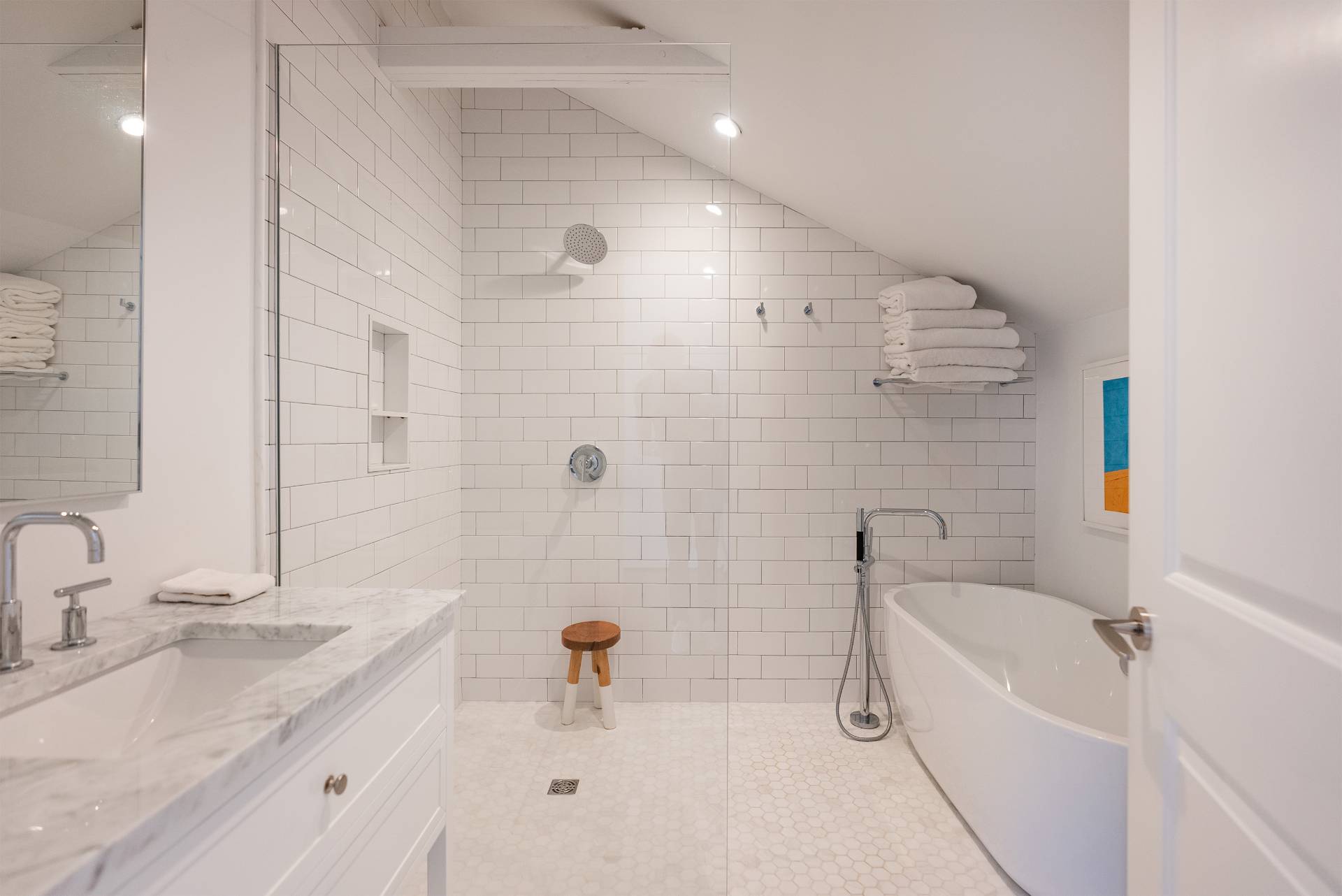 Undisclosed Address Bridgehampton, NY 11932 - Photo 14 of 25 a bathroom with a granite countertop sink a toilet and bathtub