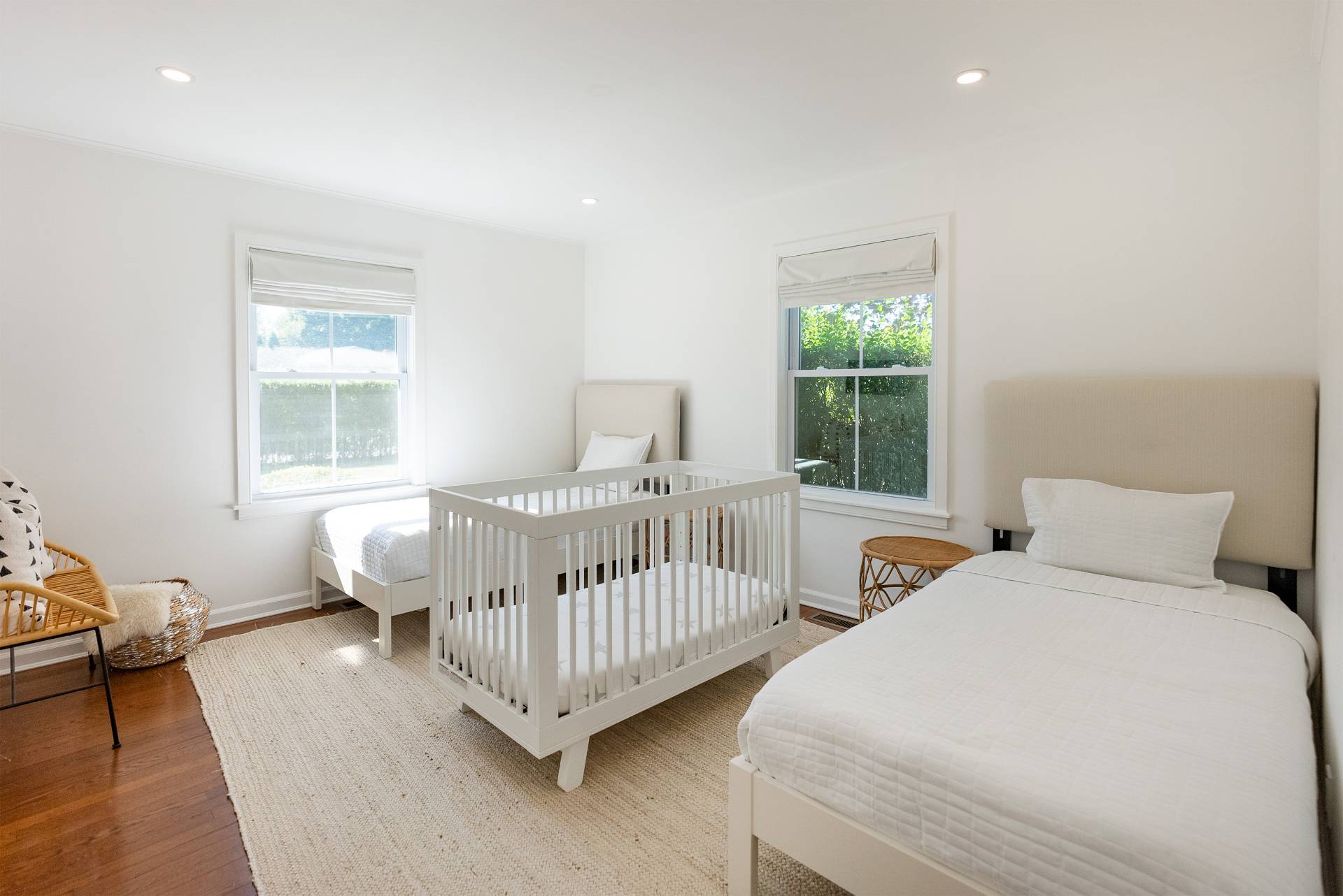 Undisclosed Address Bridgehampton, NY 11932 - Photo 15 of 25 a bedroom with two beds and a window