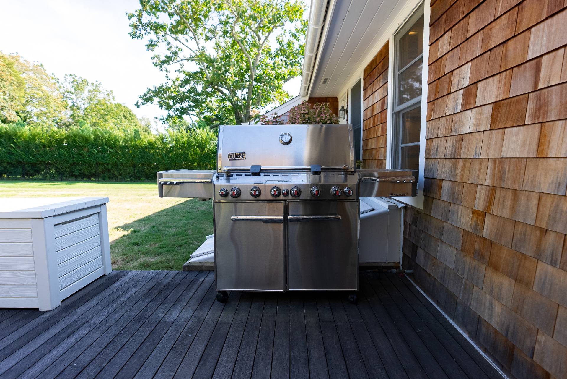Undisclosed Address Bridgehampton, NY 11932 - Photo 18 of 25 a room with outdoor seating and wooden fence