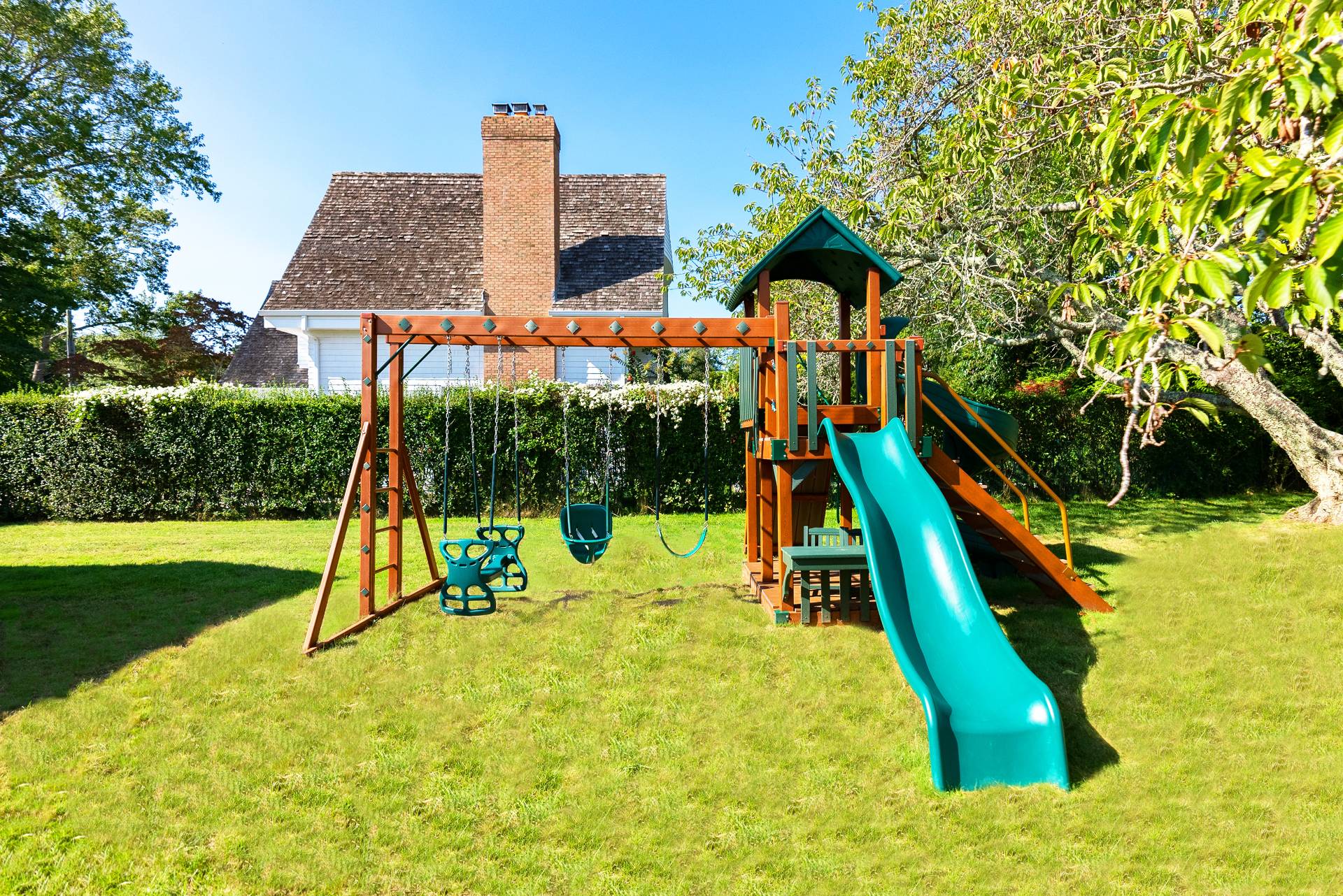 Undisclosed Address Bridgehampton, NY 11932 - Photo 20 of 25 a view of swimming pool with a backyard and a slide