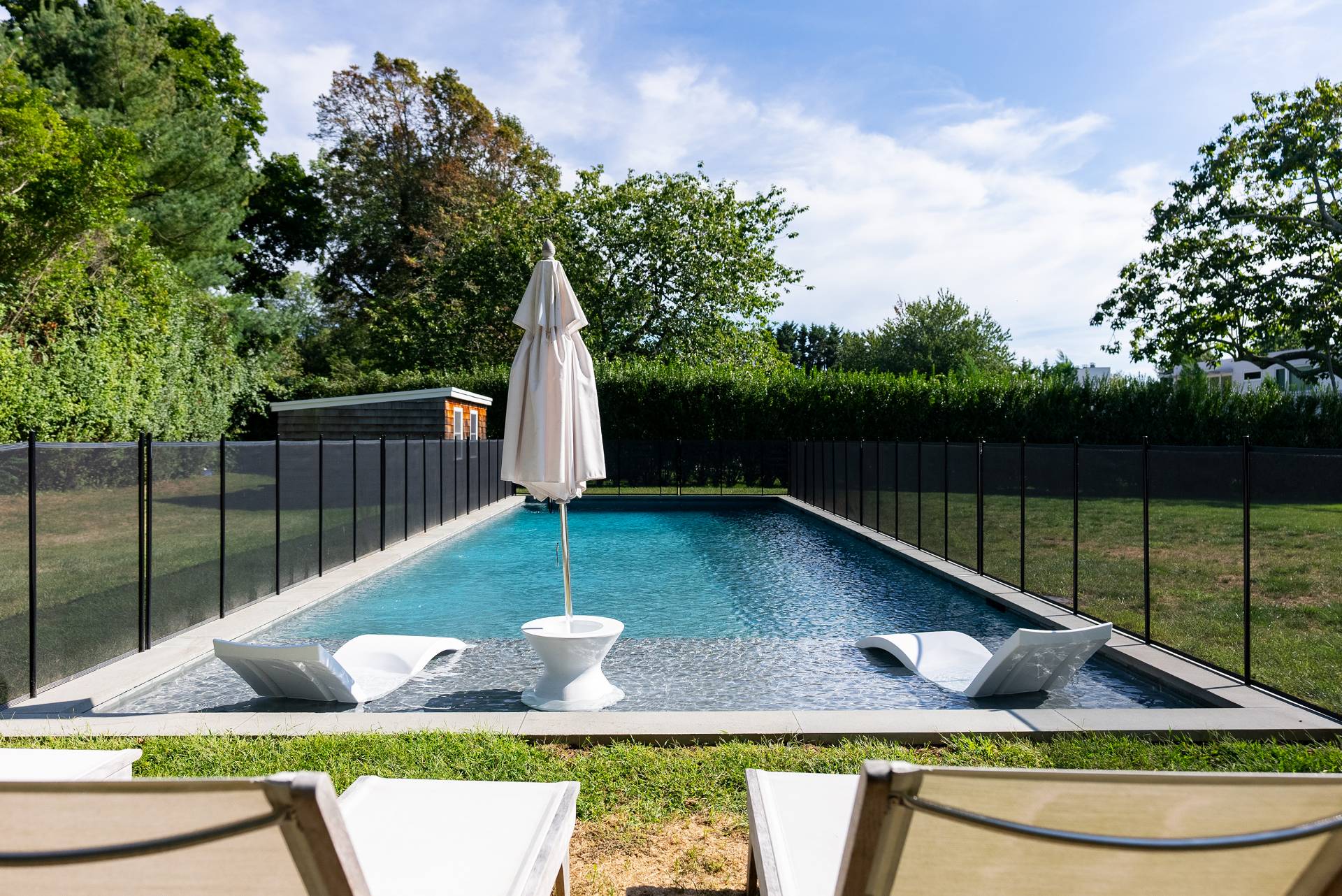 Undisclosed Address Bridgehampton, NY 11932 - Photo 22 of 25 a view of yard from deck with patio