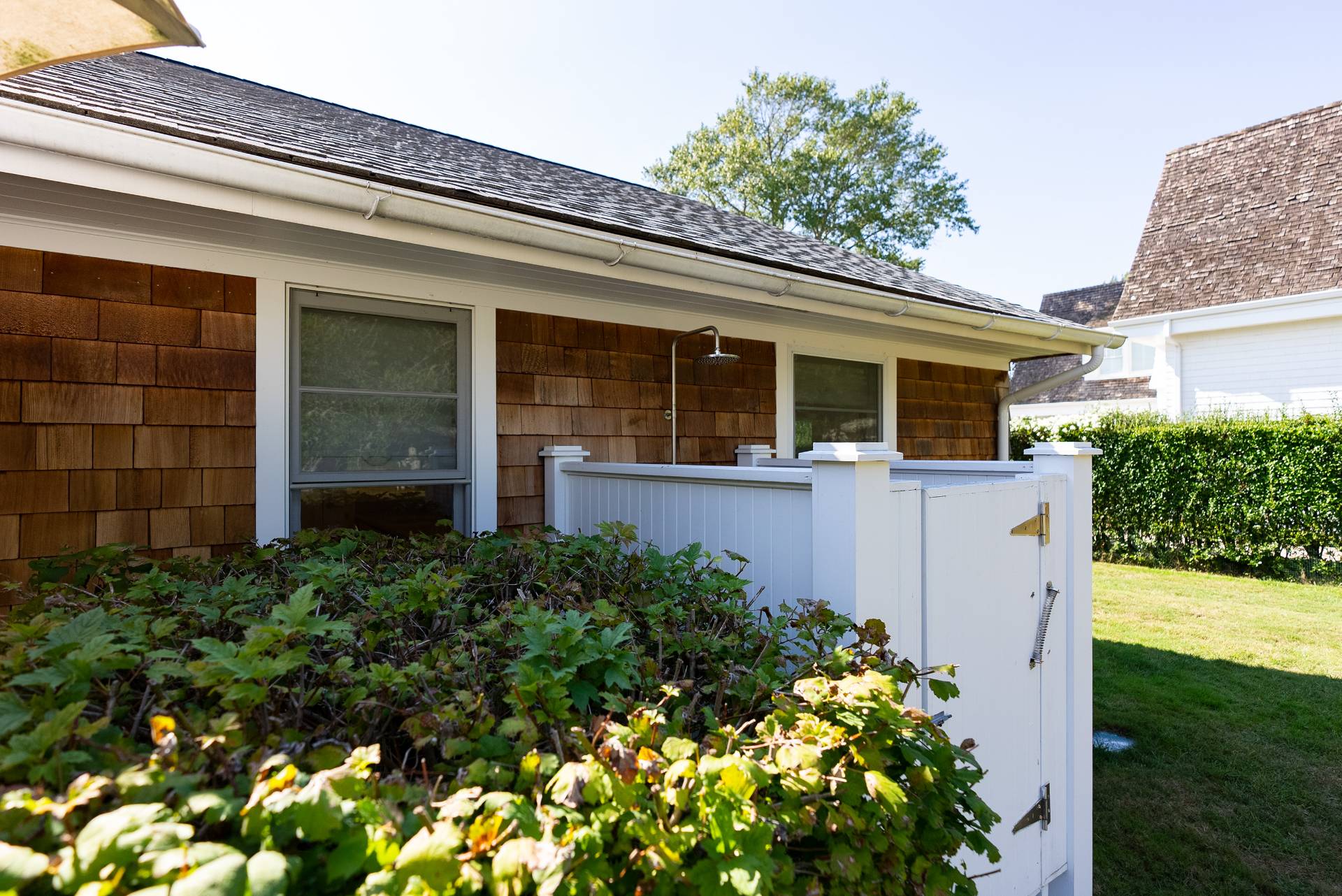 Undisclosed Address Bridgehampton, NY 11932 - Photo 23 of 25 front view of a house with a yard
