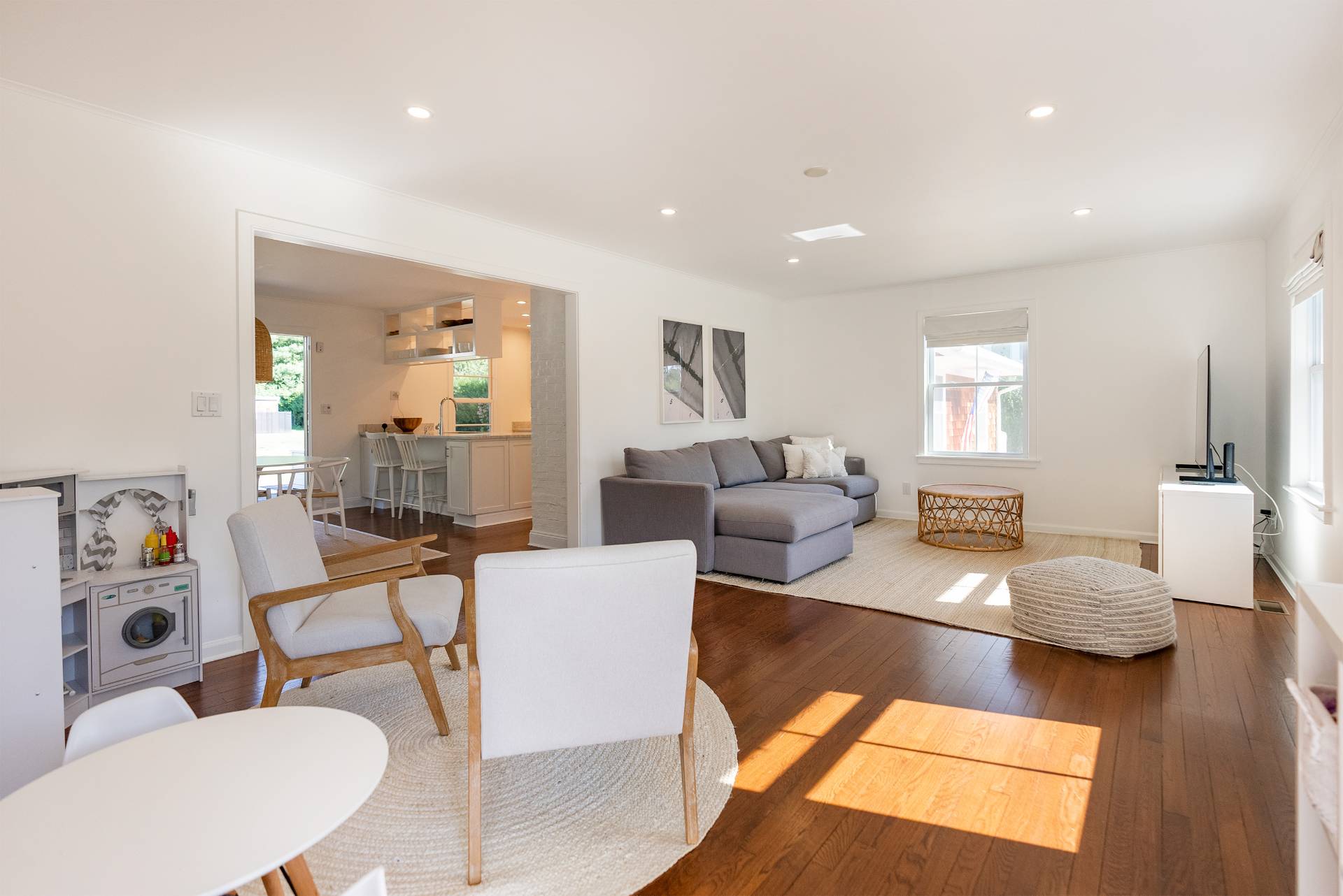 Undisclosed Address Bridgehampton, NY 11932 - Photo 5 of 25 a living room with furniture and a wooden floor