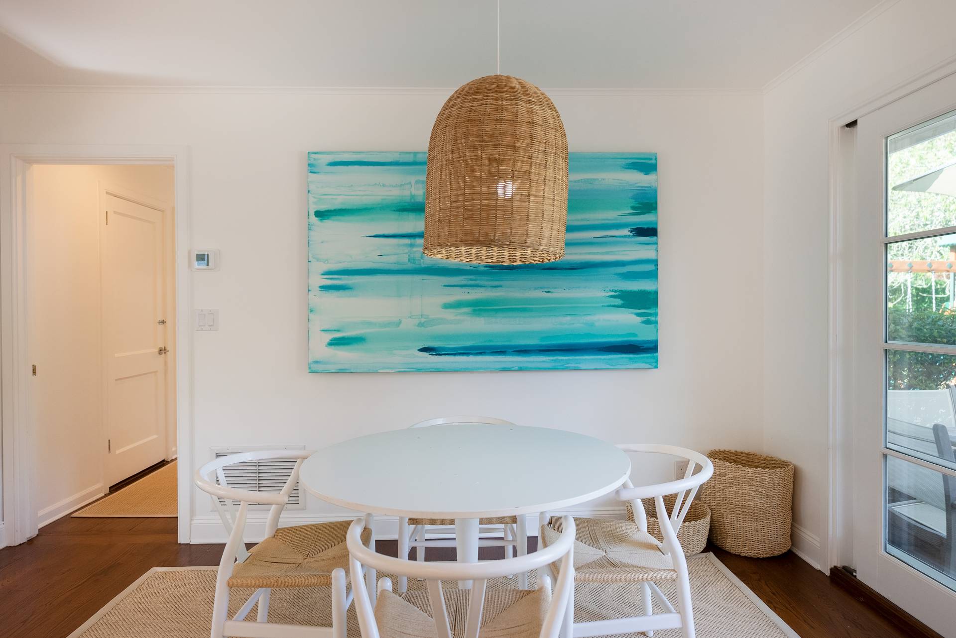 Undisclosed Address Bridgehampton, NY 11932 - Photo 9 of 25 a view of a dining room with furniture and wooden floor