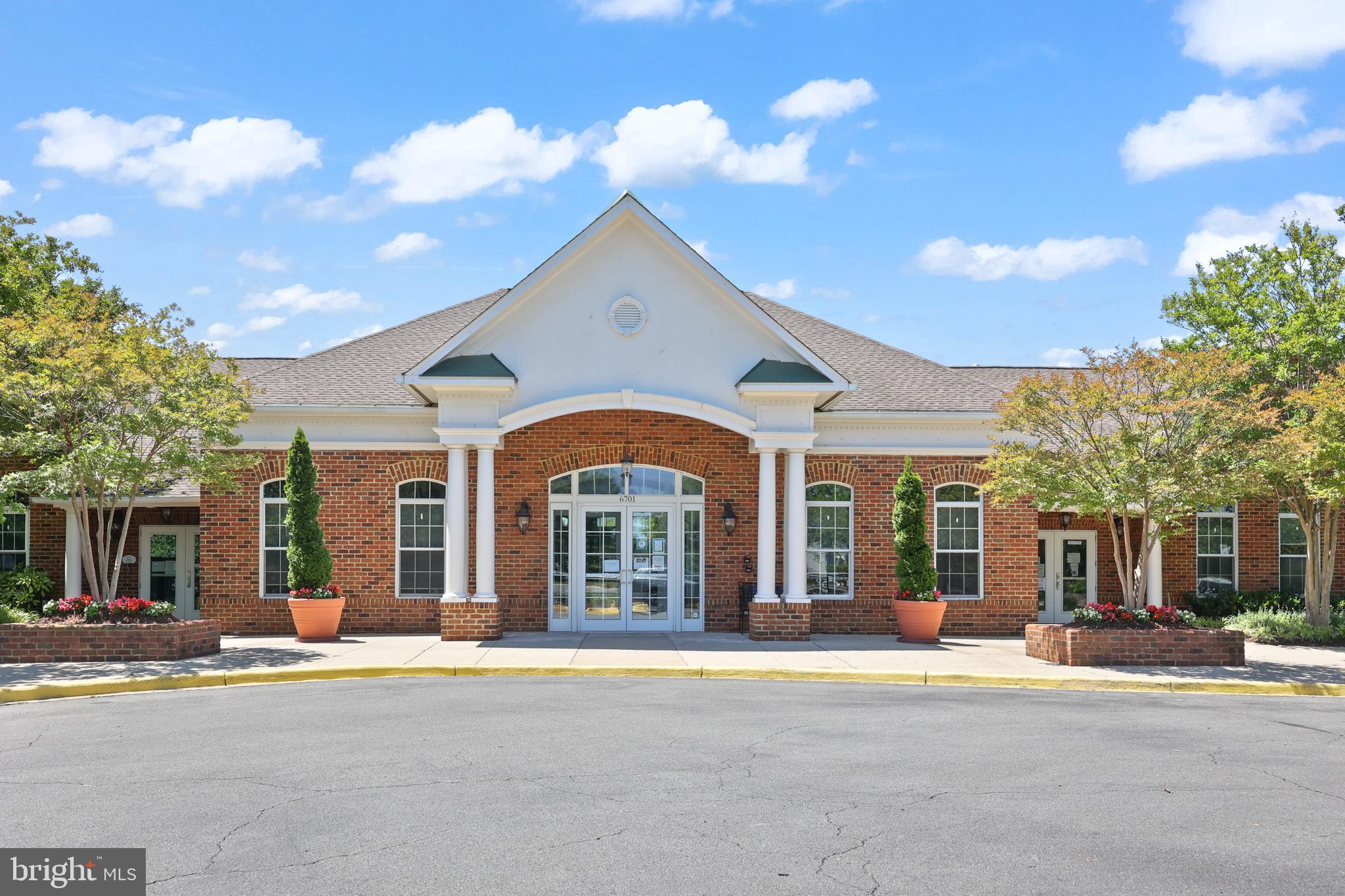 6806 Witton Circle Gainesville, VA 20155 - Photo 36 of 47 a view of a building with a patio