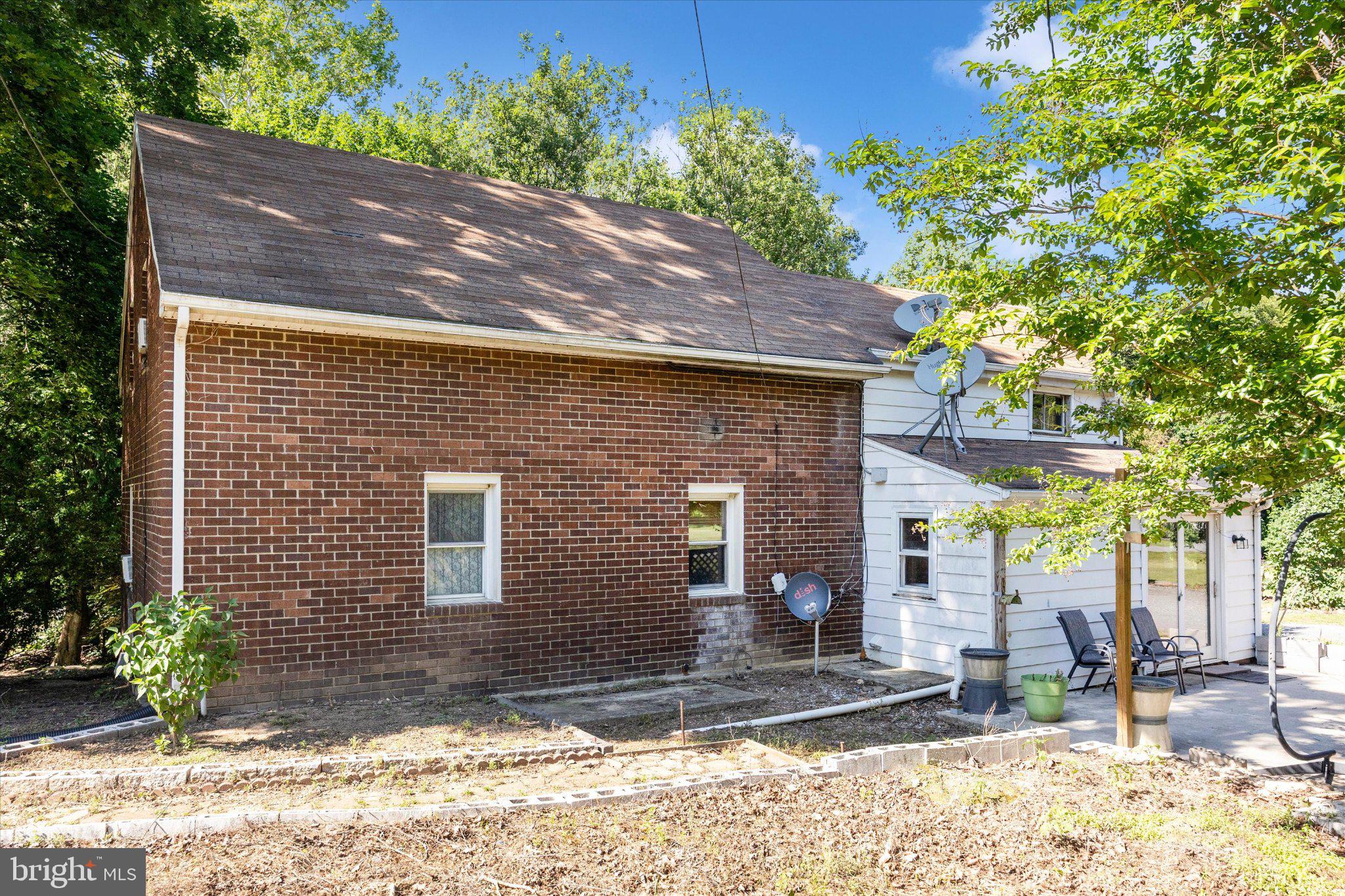 14721 Albert Staub Road Thurmont, MD 21788 - Photo 40 of 46 a view of a house with a yard