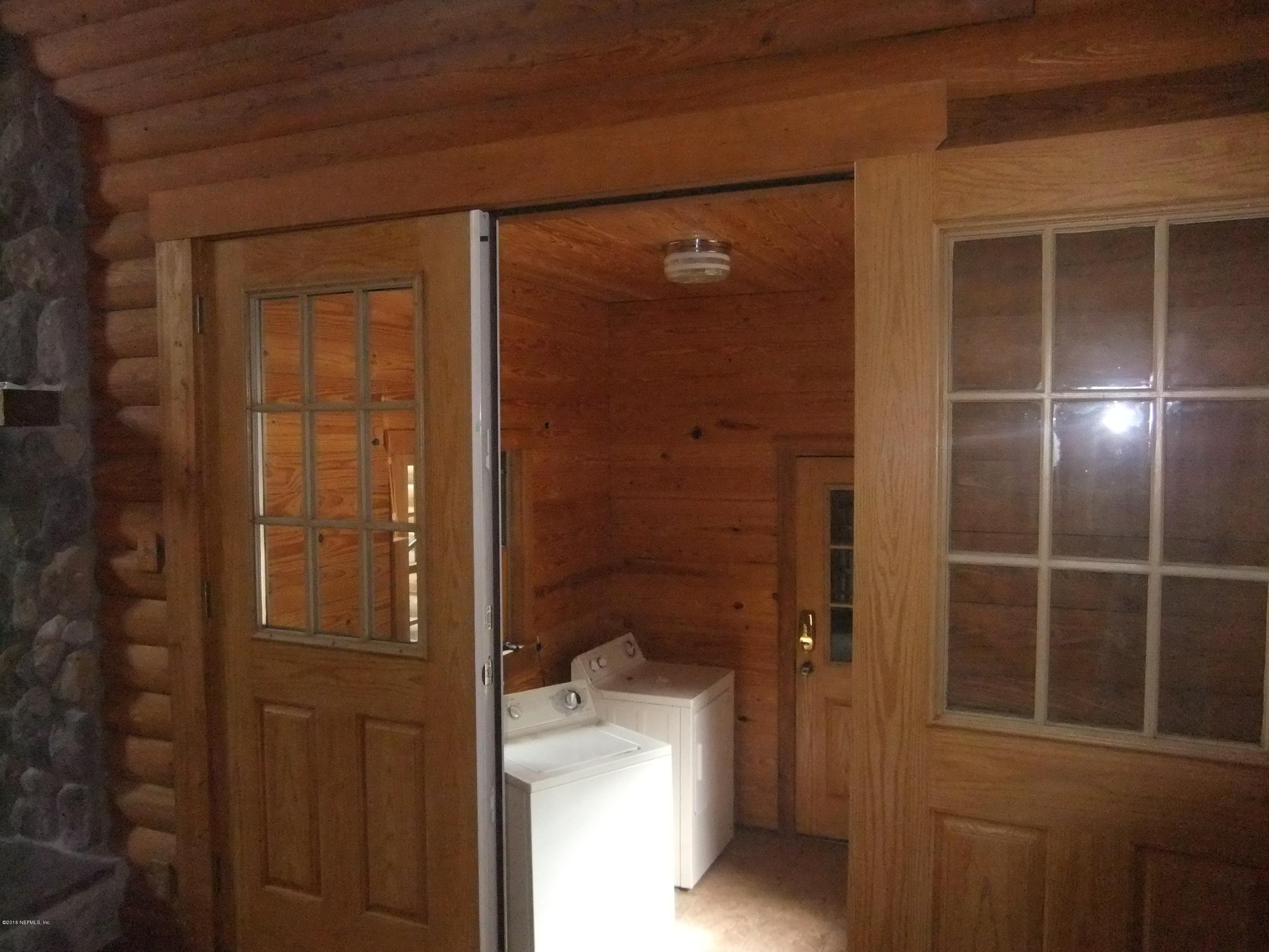 1700 Lake Road Jacksonville, FL 32226 - Photo 13 of 46 a bathroom with a glass door shower