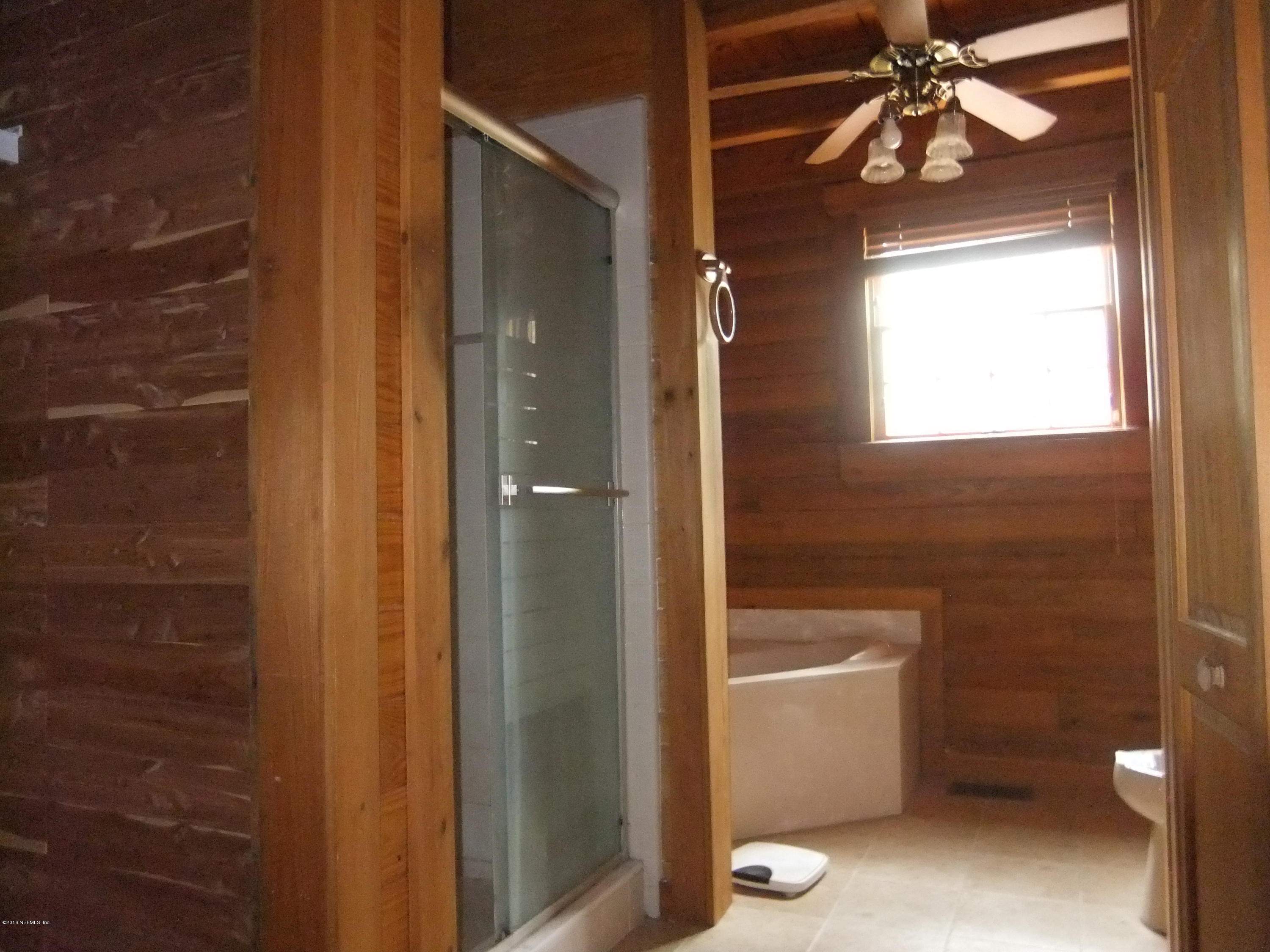 1700 Lake Road Jacksonville, FL 32226 - Photo 25 of 46 a bathroom with a toilet and a shower