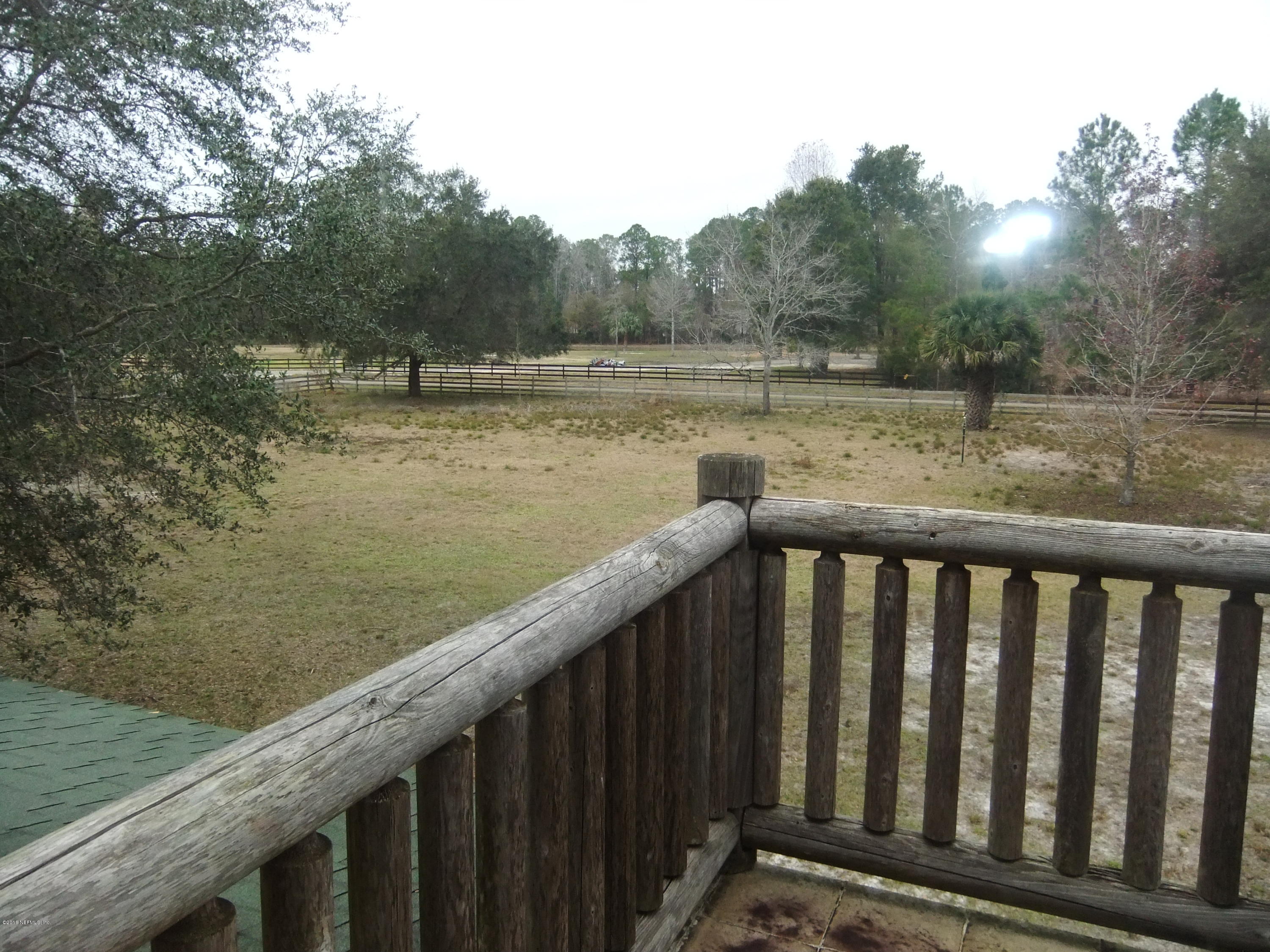 1700 Lake Road Jacksonville, FL 32226 - Photo 26 of 46 a balcony with wooden floor and lake view