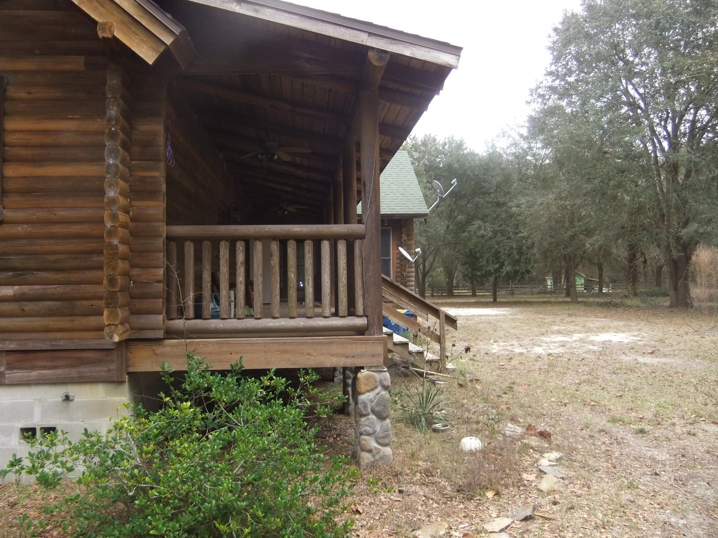 1700 Lake Road Jacksonville, FL 32226 - Photo 29 of 46 a view of a backyard with a chair