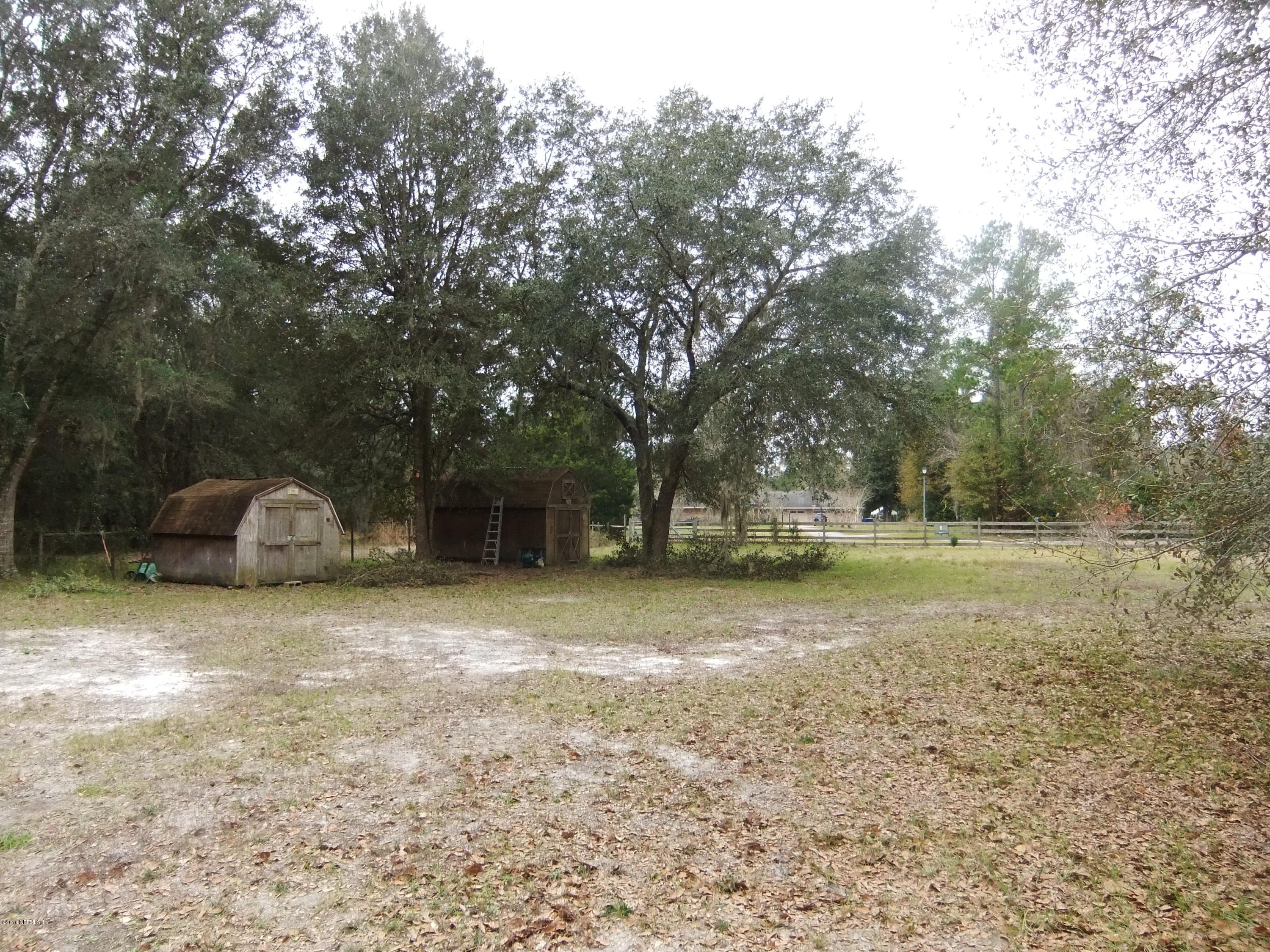 1700 Lake Road Jacksonville, FL 32226 - Photo 31 of 46 a house with trees in front of it