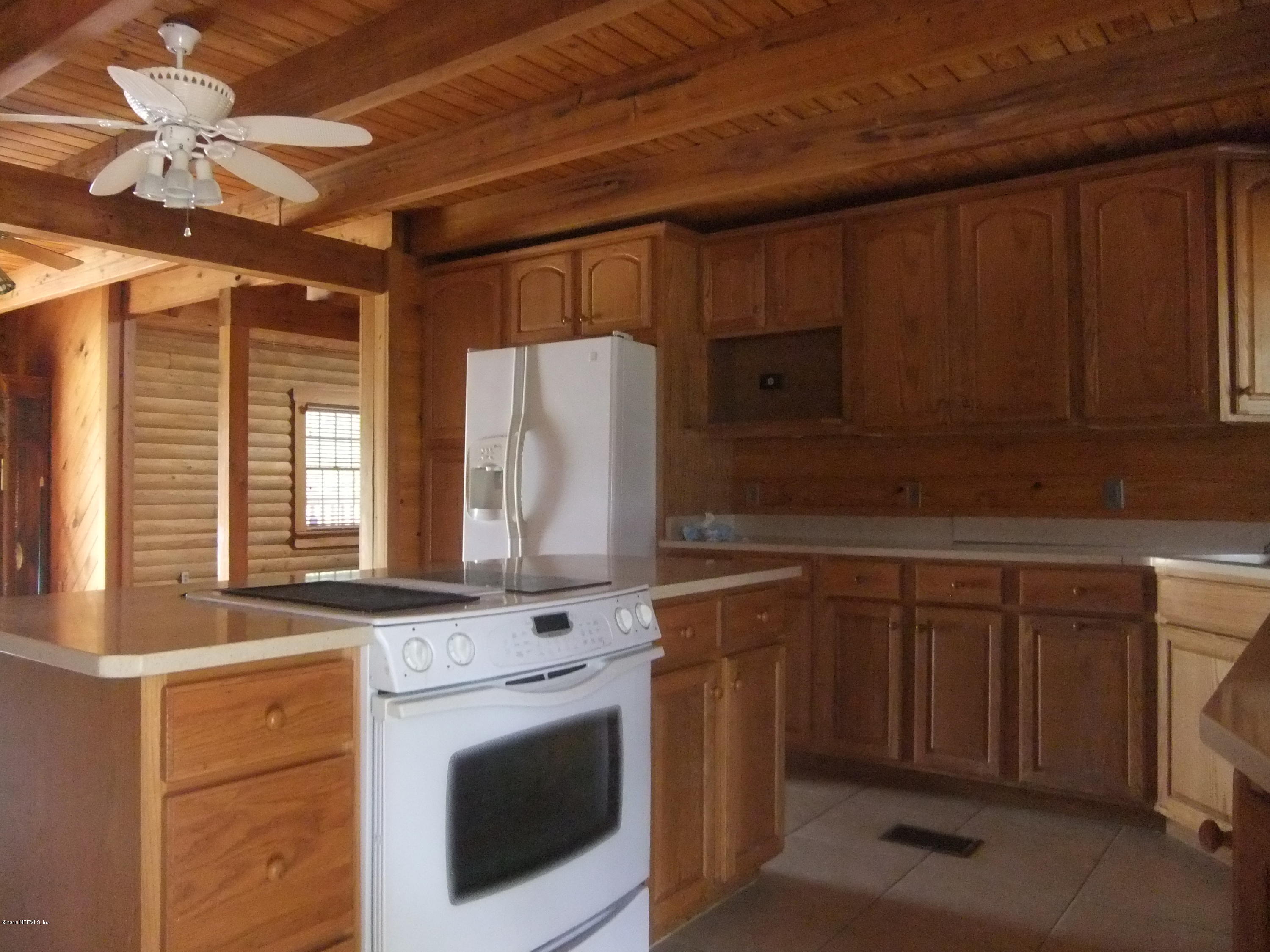 1700 Lake Road Jacksonville, FL 32226 - Photo 5 of 46 a kitchen with appliances cabinets and a sink