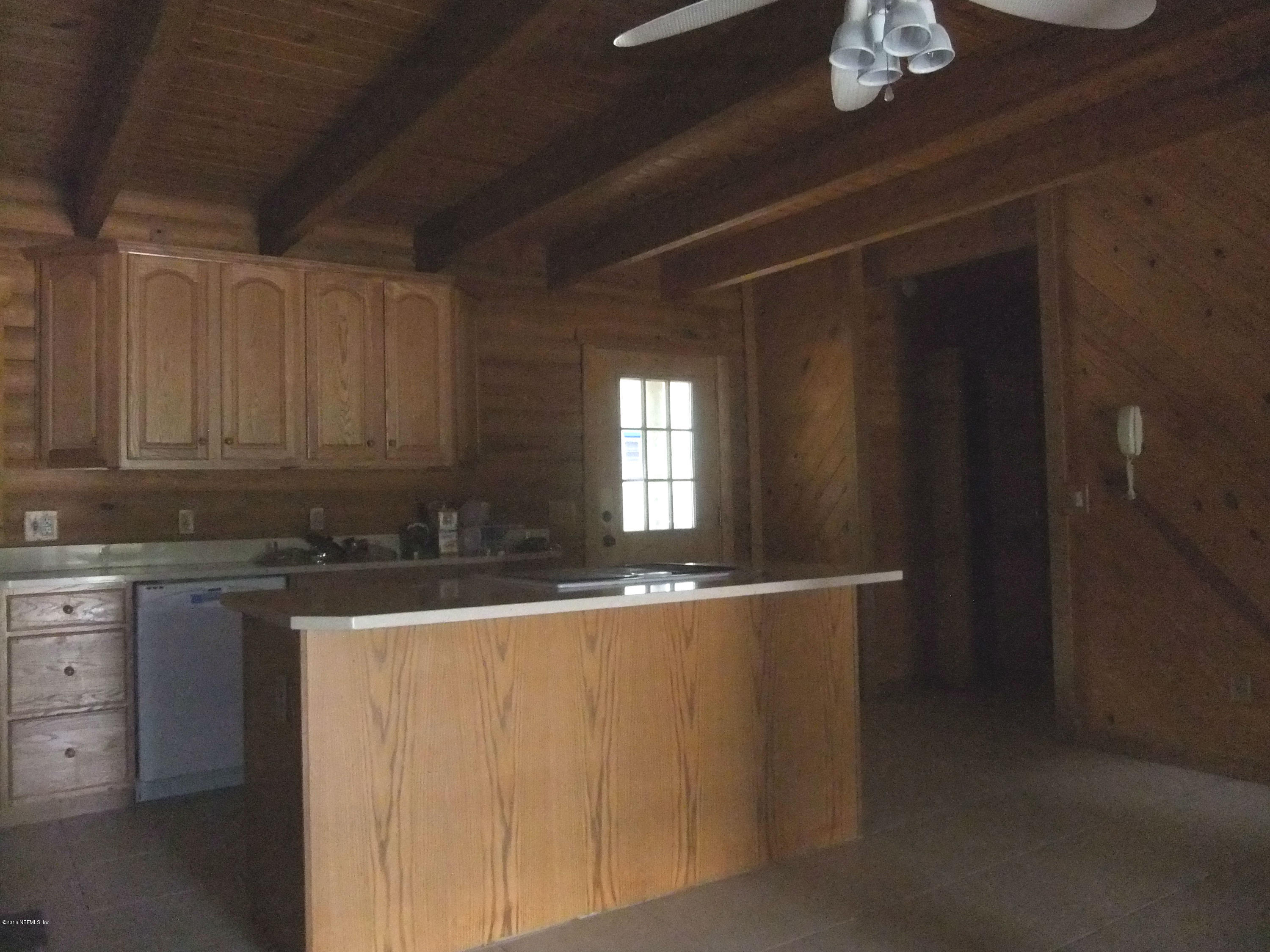 1700 Lake Road Jacksonville, FL 32226 - Photo 9 of 46 a kitchen with a sink and cabinets