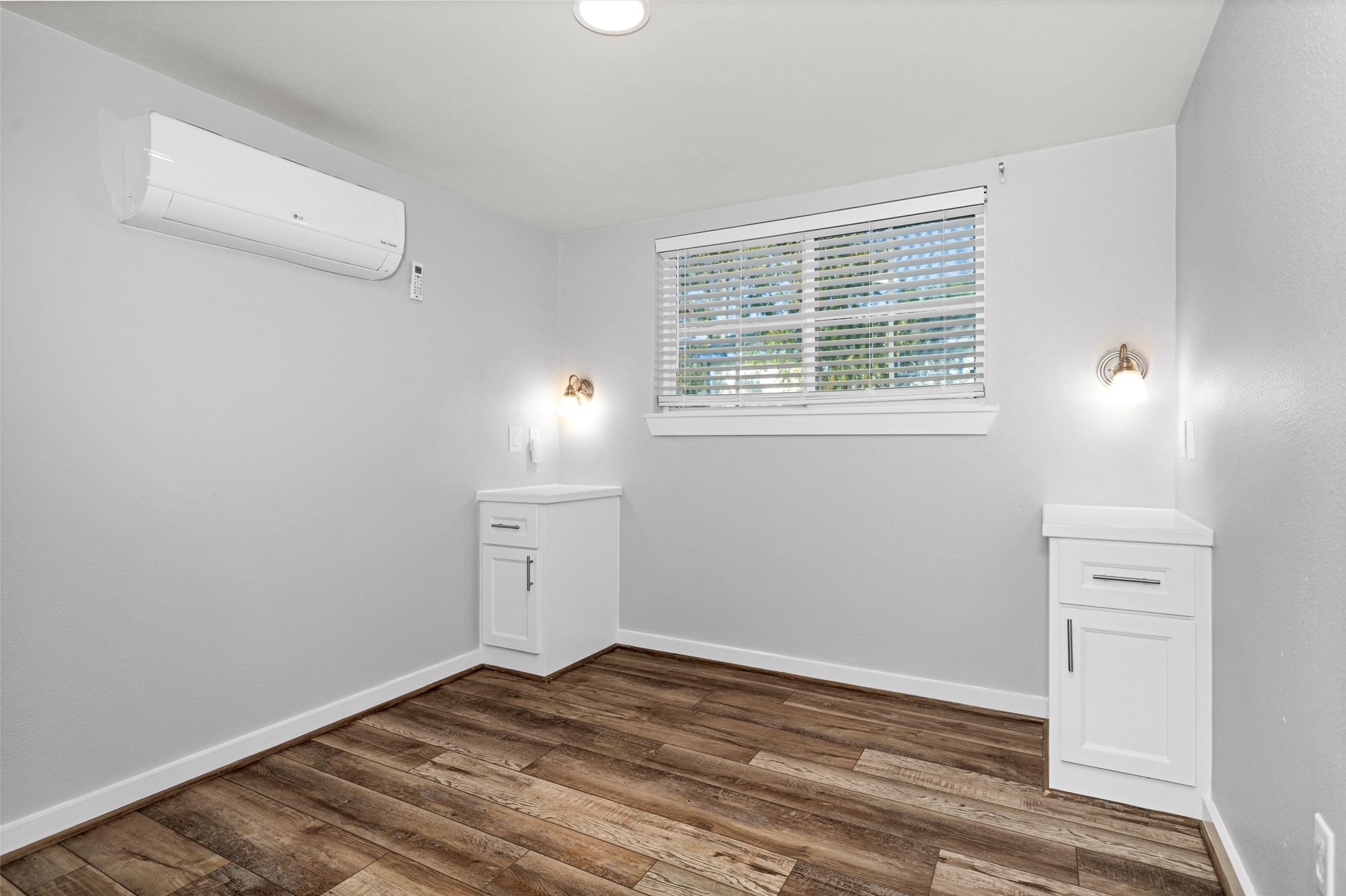 12922 Longstreet Road, Unit 711 Willis, TX 77318 - Photo 10 of 29 a view of empty room with wooden floor