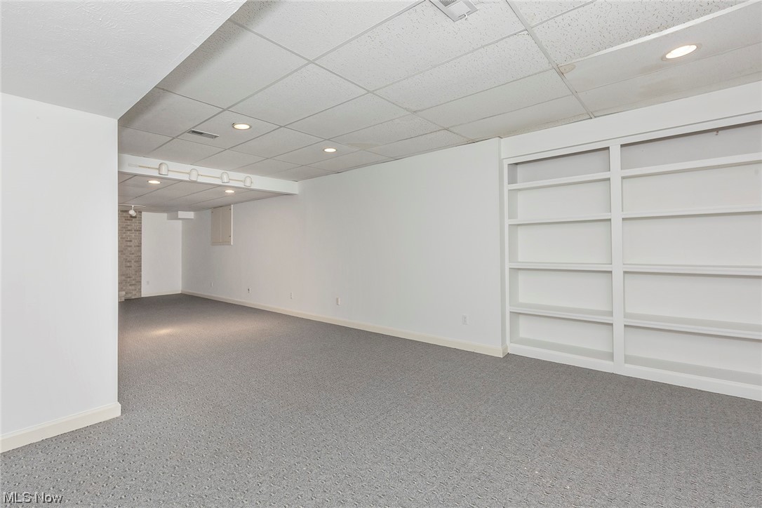 3850 Ellendale Road Moreland Hills, OH 44022 - Photo 34 of 39 Recreation Room with recessed lighting and built in shelves