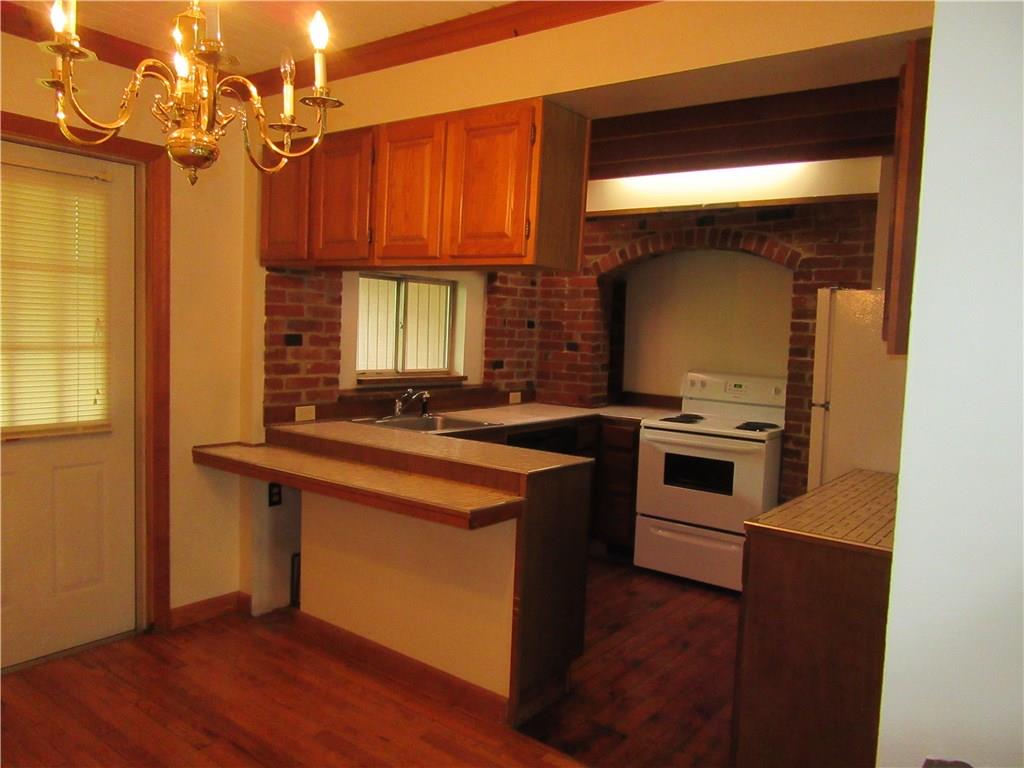 420 Manor Harrison City Road Manor, PA 15665 - Photo 23 of 25 Apartment C Dining Room and Kitchen