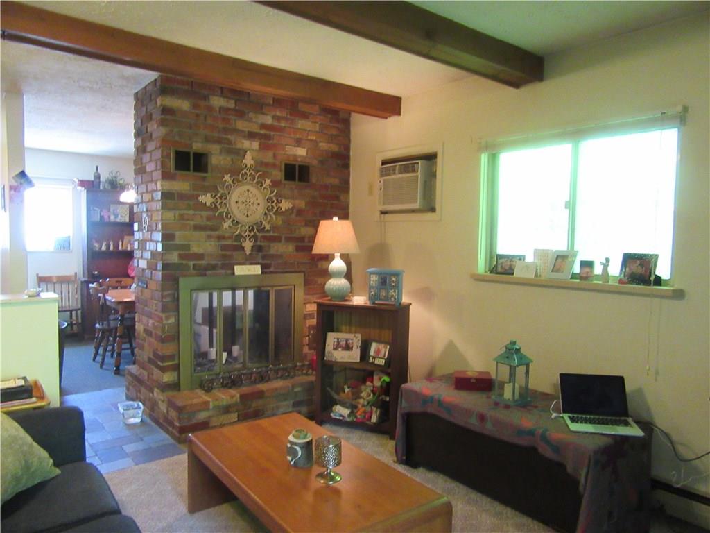 420 Manor Harrison City Road Manor, PA 15665 - Photo 10 of 25 Apartment D Living Room. All fireplaces are decreative