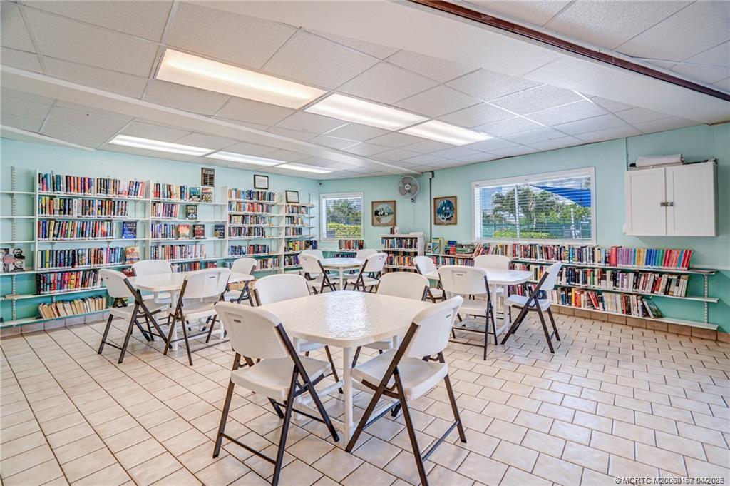 10725 South Ocean Drive, Unit 437 Jensen Beach, FL 34957 - Photo 25 of 32 a view of a dining room with furniture
