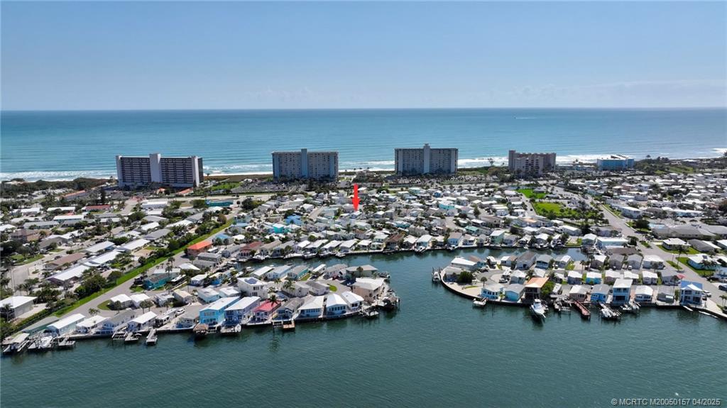 10725 South Ocean Drive, Unit 437 Jensen Beach, FL 34957 - Photo 5 of 32 a city view with lots of residential buildings
