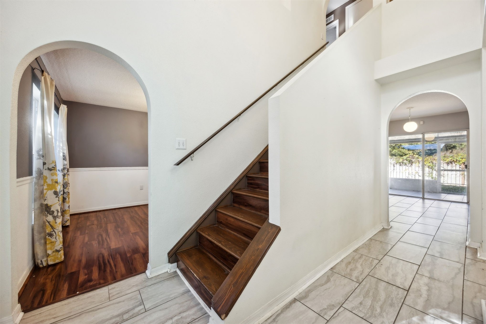 87233 Kipling Drive Yulee, FL 32097 - Photo 20 of 38 a view of a livingroom with wooden floor and stairs