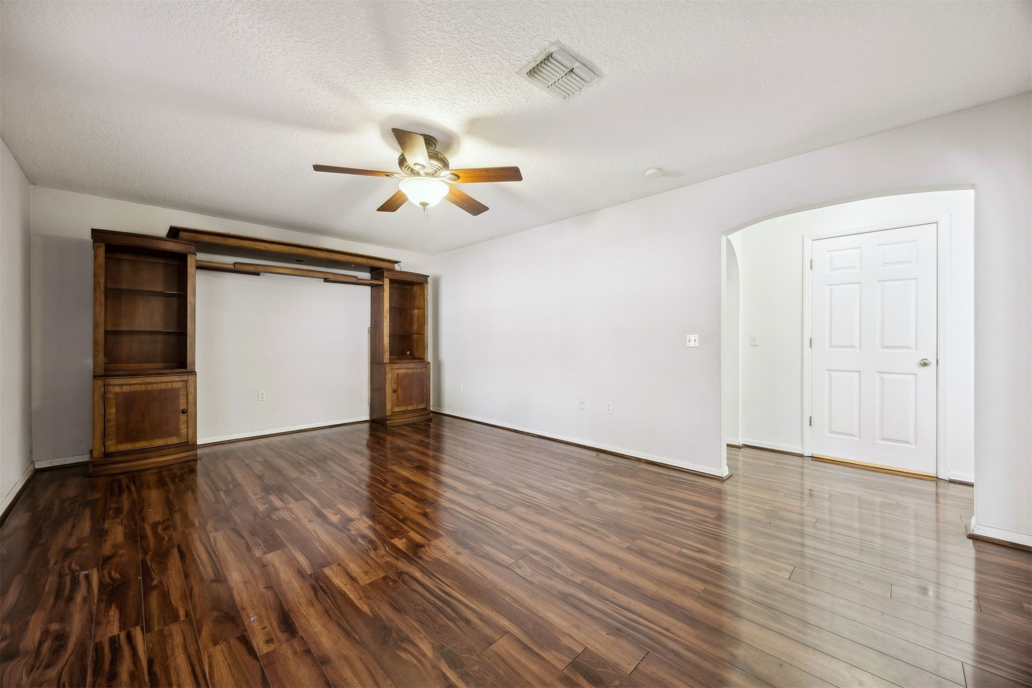 87233 Kipling Drive Yulee, FL 32097 - Photo 6 of 38 wooden floor in an empty room with a window
