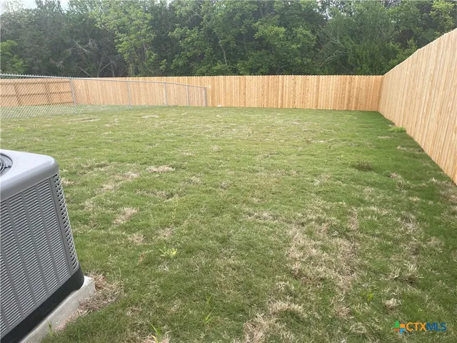 a view of outdoor space and yard