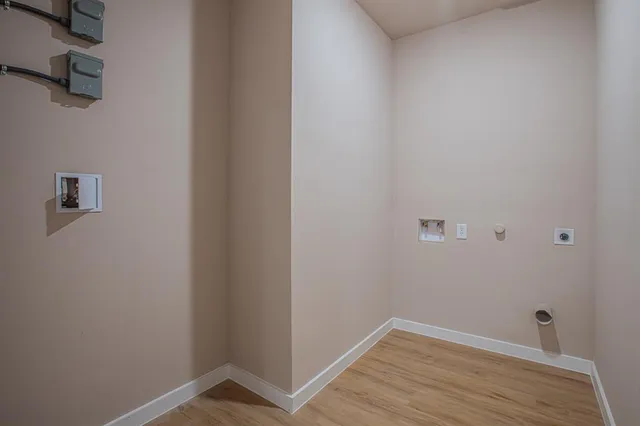 a view of small space with wooden floor