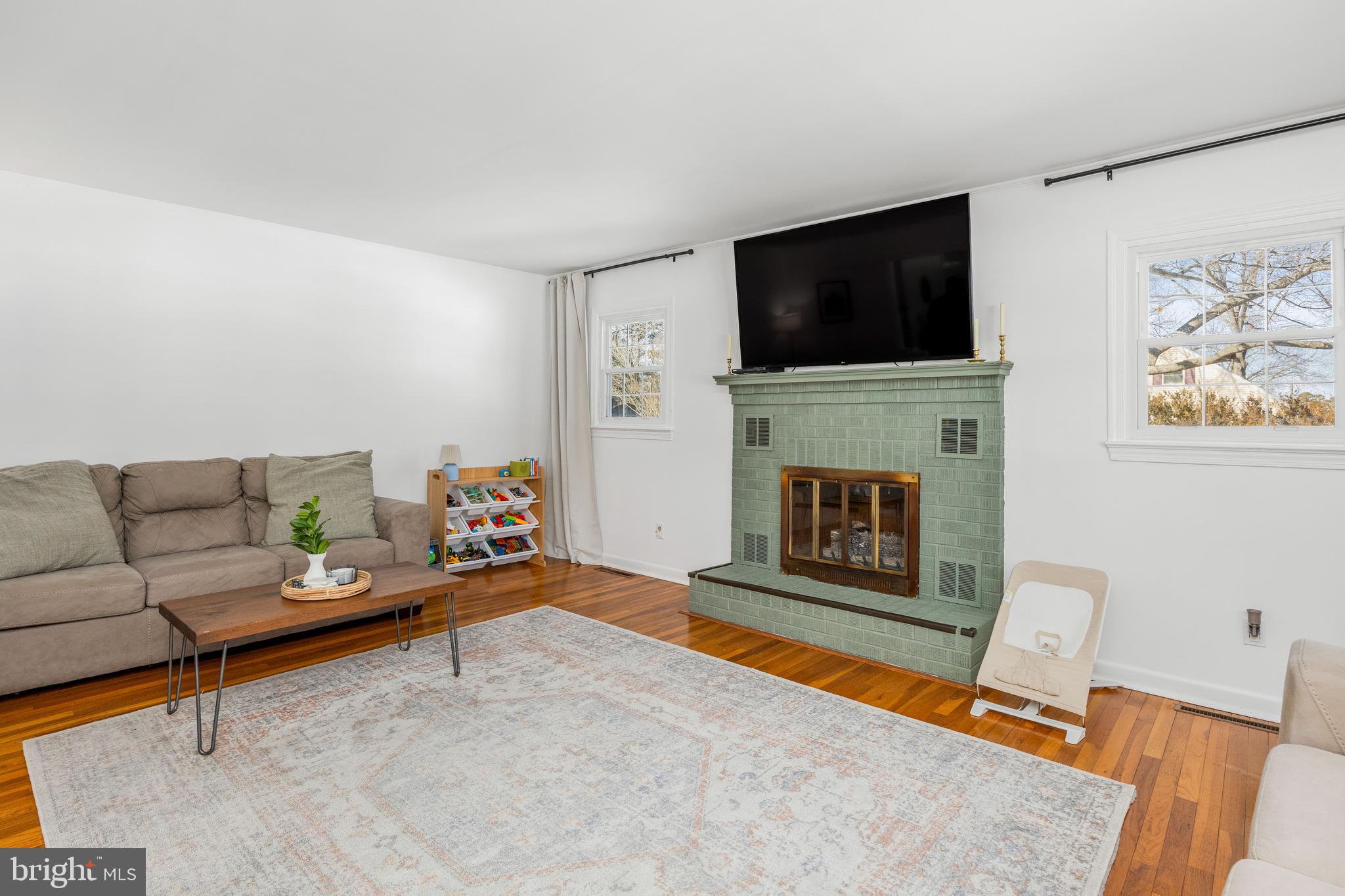 3750 Sunnyside Road East New Market, MD 21631 - Photo 17 of 45 a living room with furniture and a flat screen tv