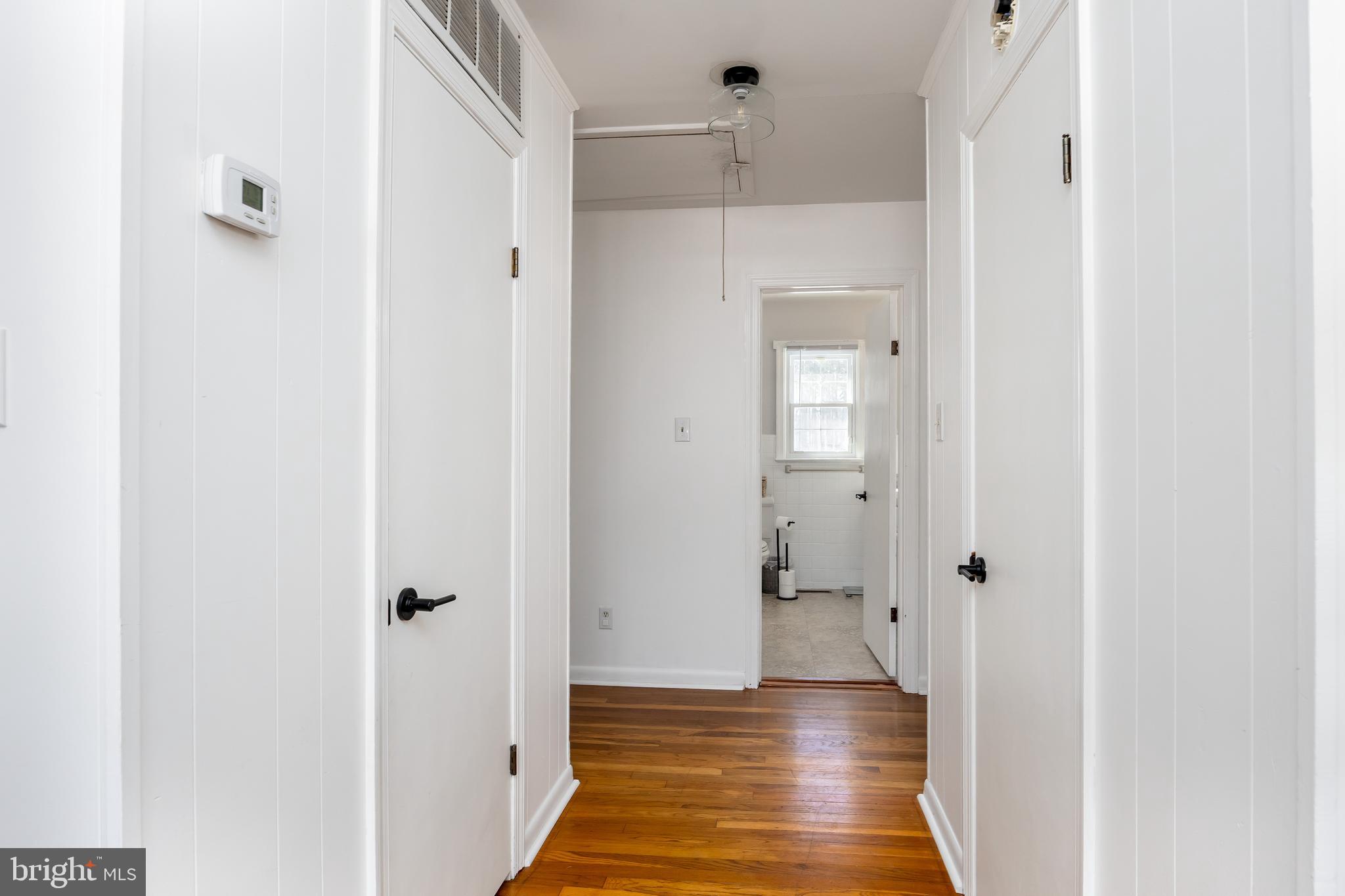 3750 Sunnyside Road East New Market, MD 21631 - Photo 20 of 45 a view of a hallway with wooden floor
