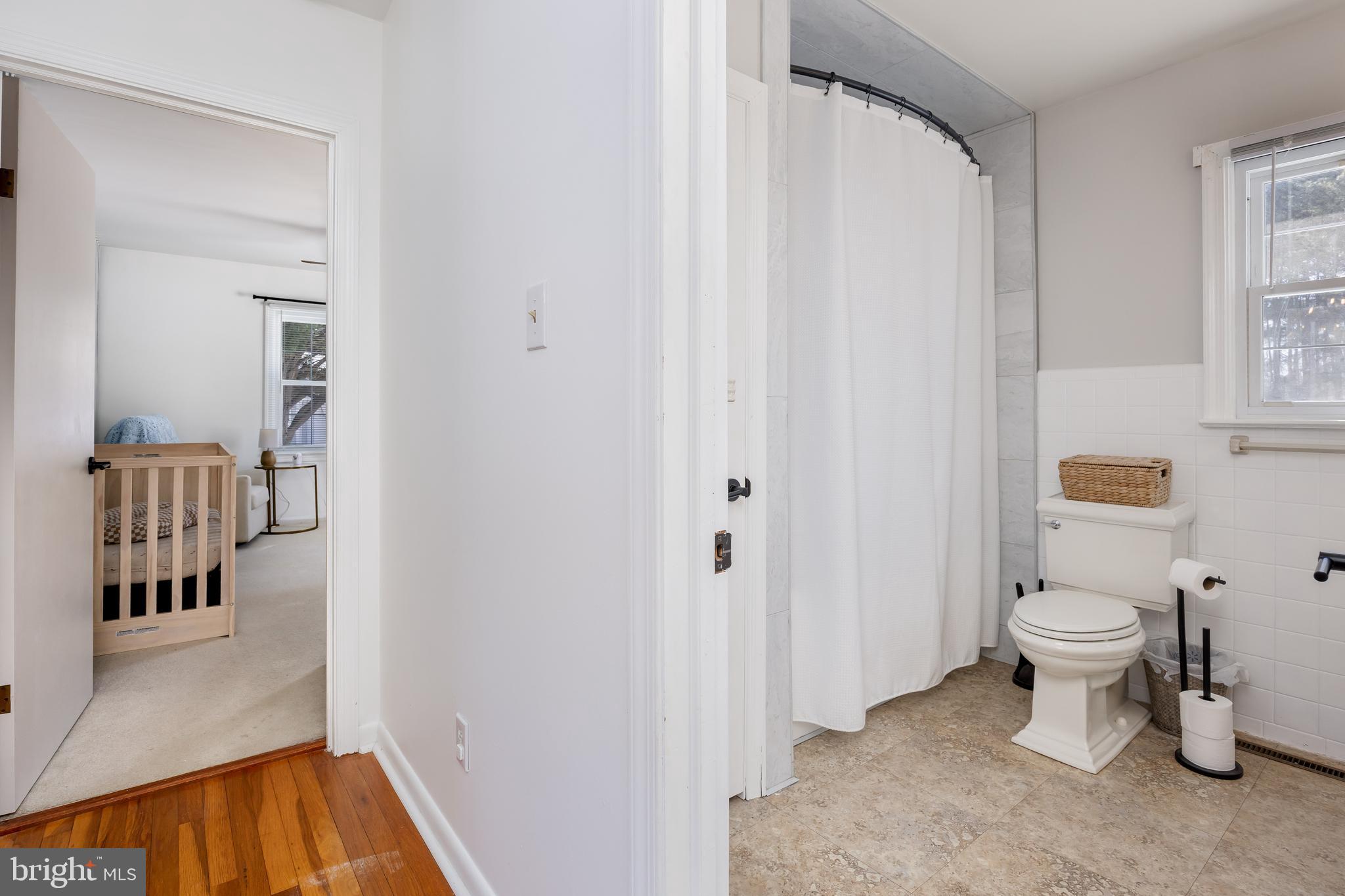 3750 Sunnyside Road East New Market, MD 21631 - Photo 25 of 45 a bathroom with a toilet a sink and a shower