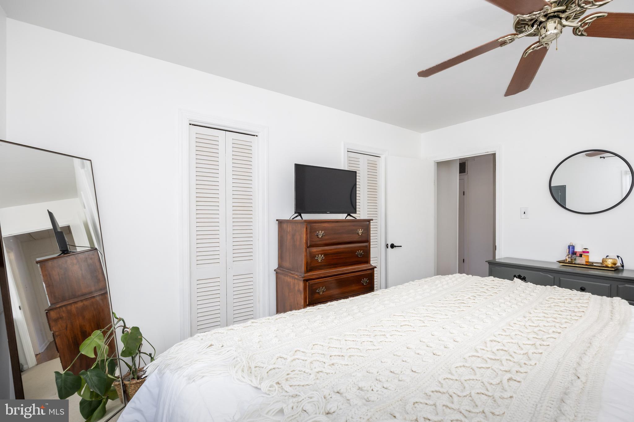 3750 Sunnyside Road East New Market, MD 21631 - Photo 33 of 45 a bedroom with a bed and a flat screen tv