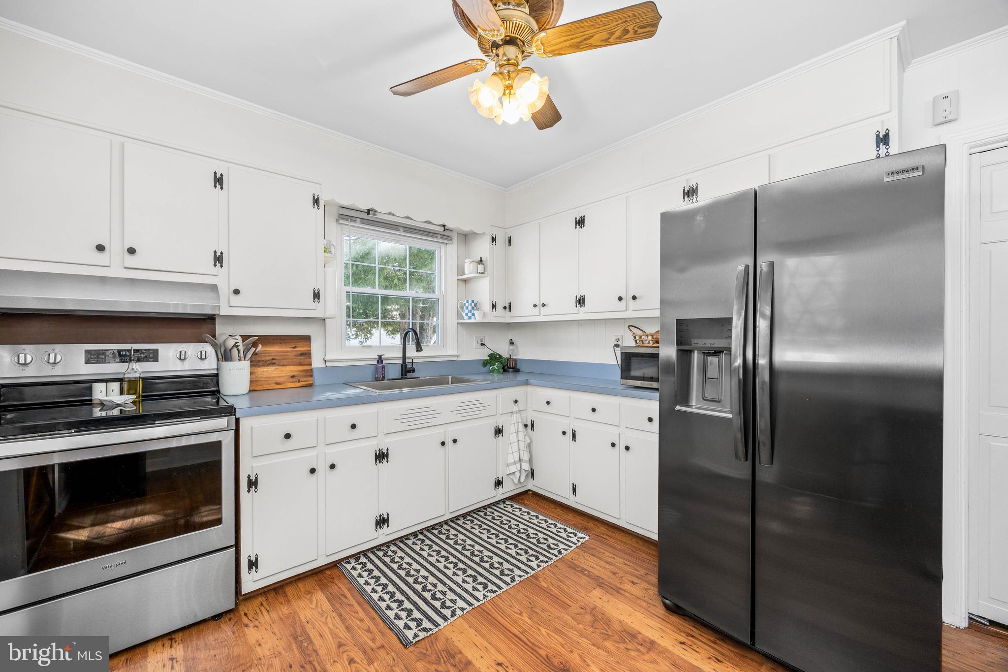 3750 Sunnyside Road East New Market, MD 21631 - Photo 5 of 45 a kitchen with stainless steel appliances granite countertop a stove a refrigerator and a granite counter tops