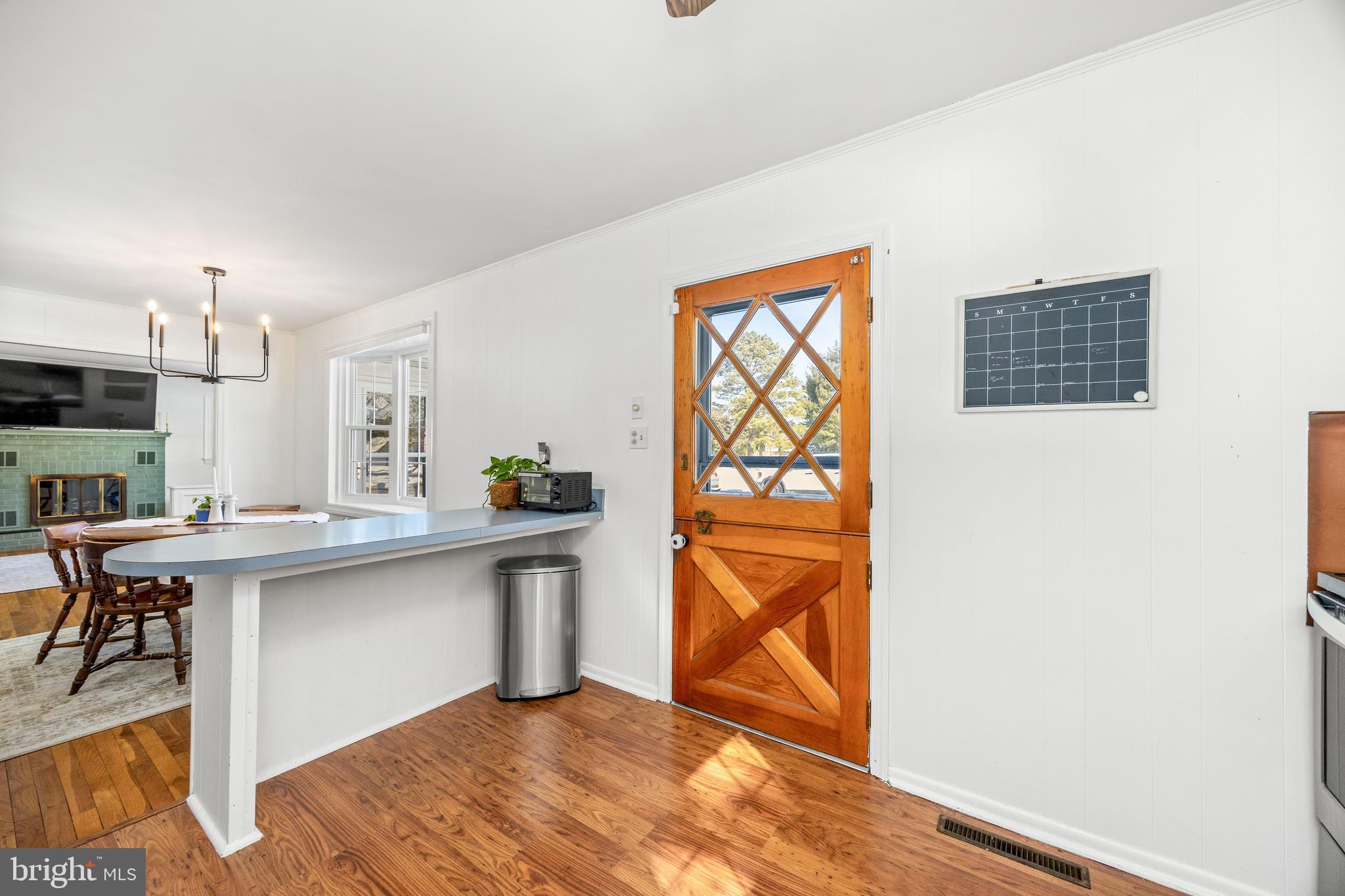 3750 Sunnyside Road East New Market, MD 21631 - Photo 8 of 45 a kitchen with stainless steel appliances granite countertop a stove a sink and a microwave
