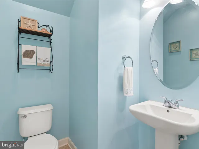 a view of a patio with a table and chairs