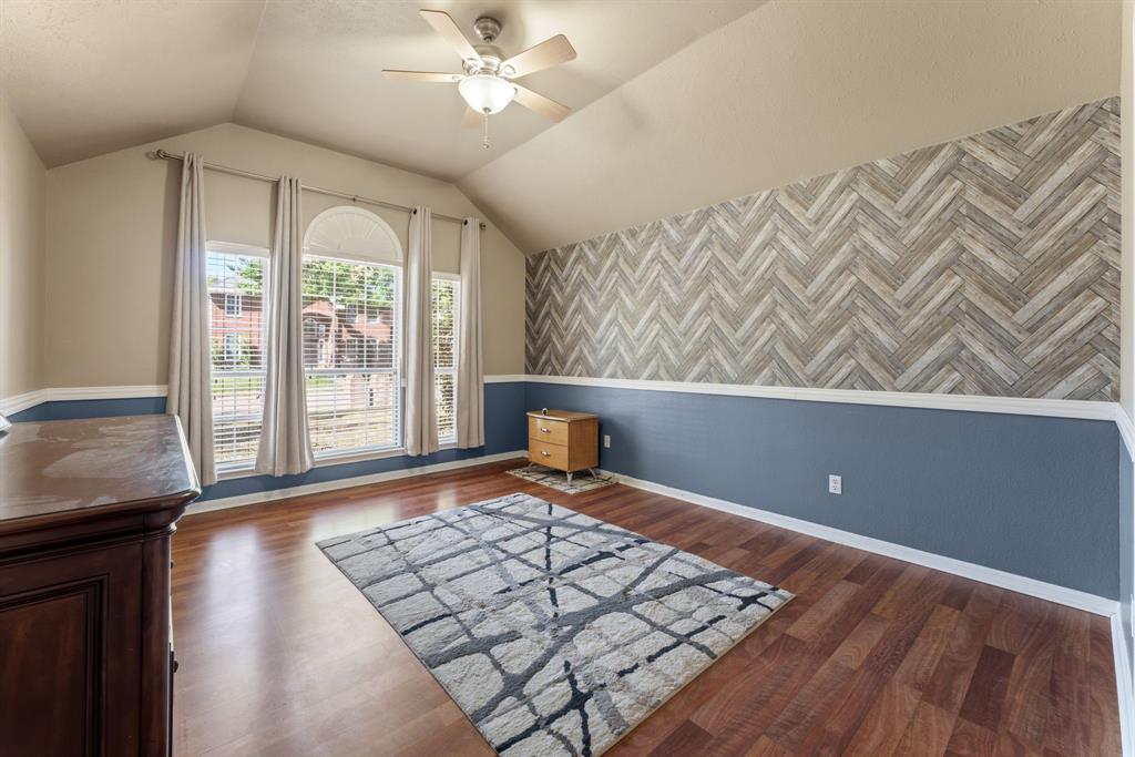 706 Sycamore Creek Road Allen, TX 75002 - Photo 13 of 28 a view of an empty room with a window