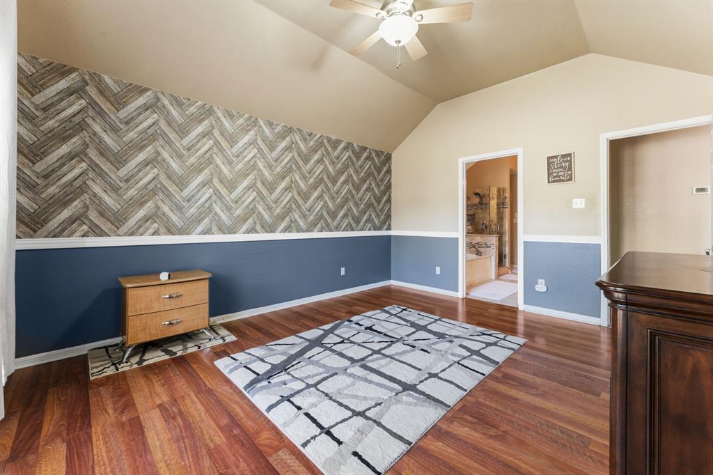 706 Sycamore Creek Road Allen, TX 75002 - Photo 14 of 28 wooden floor with a book shelf