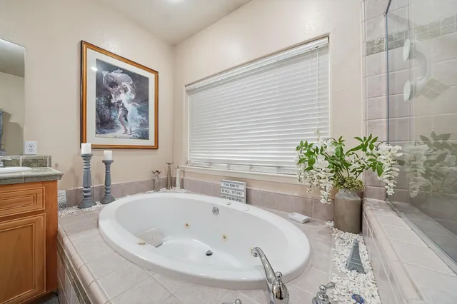 a white bath tub sitting in a bathroom