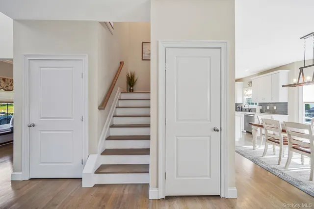 a bathroom with a sink a toilet and bathtub