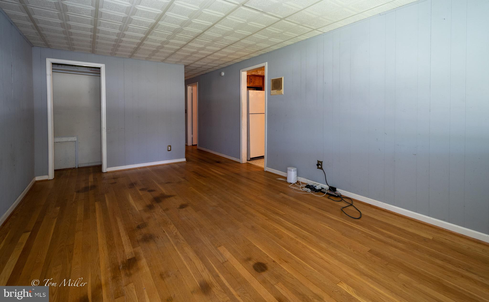 313 Riverside Drive Baltimore, MD 21221 - Photo 4 of 47 Family Room - New carpet over this hardwood