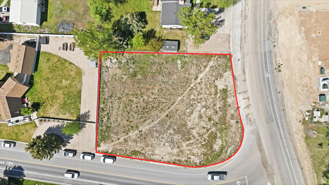 123 West 1050th North, Unit 41 Midway, UT 84049 - Photo 2 of 22 Expansive vacant lot with a perimeter outlined in red, featuring direct access to a paved road